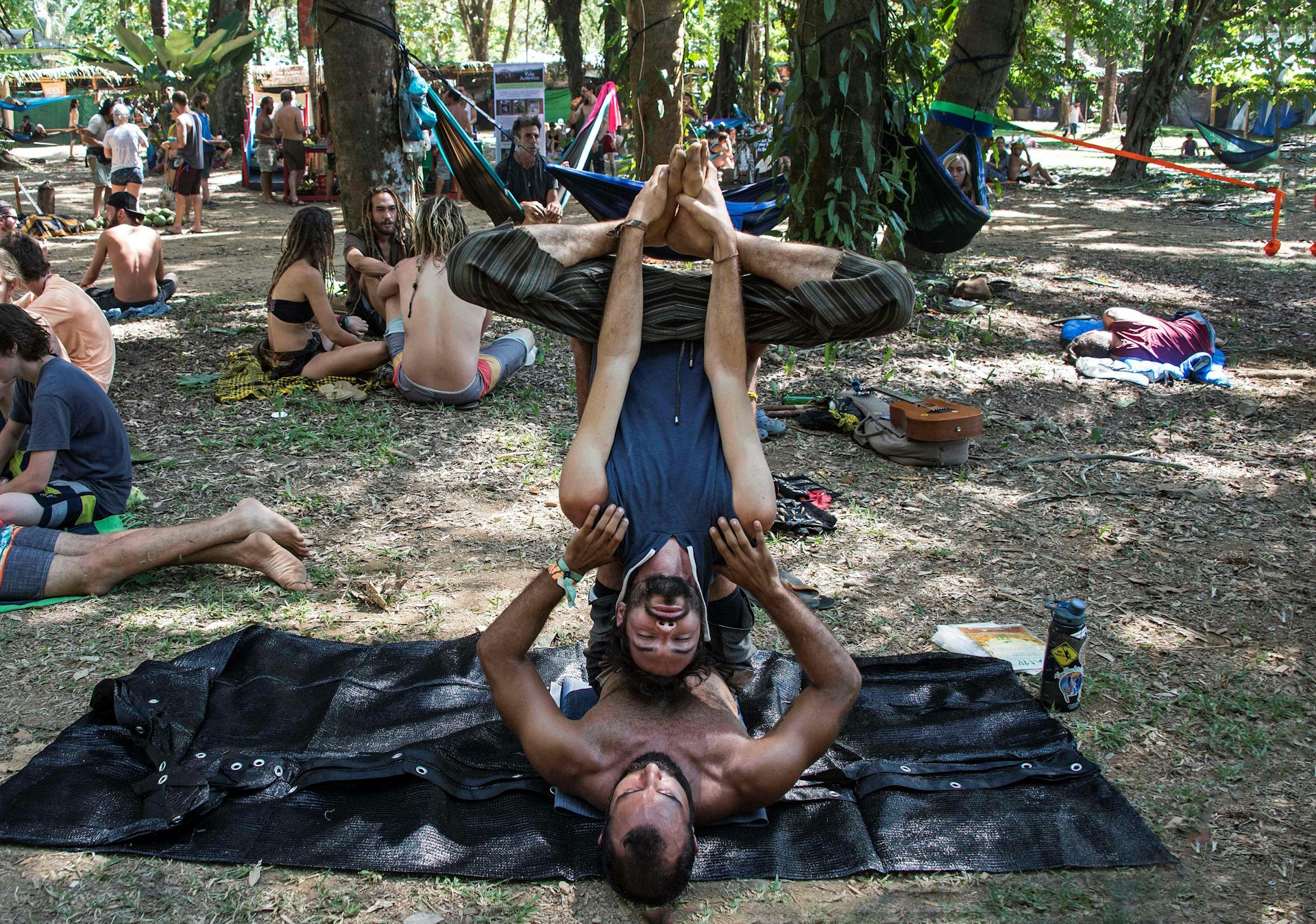 Men practice Acroyoga during the Envision Festival in Puntarenas, Uvita, 149 miles (240 km) south of San Jose, Costa Rica. The festival brings thousands together for yoga, music and other wellness classes. Ezequiel Becerra/Getty Images