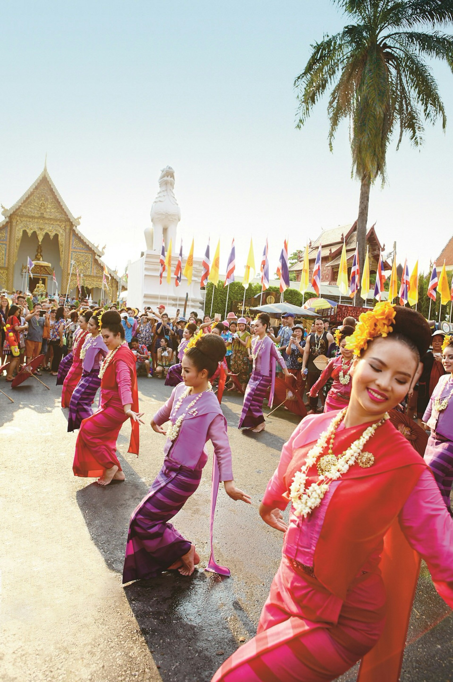Songkran Festival parade dancers clad in colourful dress © Matt Munro / Lonely Planet