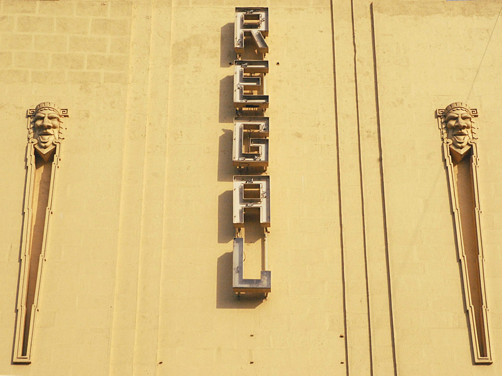 Classic Art Deco motifs on the frontage of the Regal Cinema, Colaba © Joe Bindloss / Lonely Planet