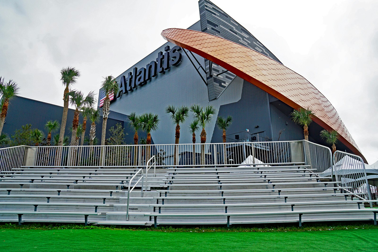 side view of the Atlantis exhibit at the Kennedy Space Center, with bleachers to view a shuttle launch; how to experience a rocket launch in Florida