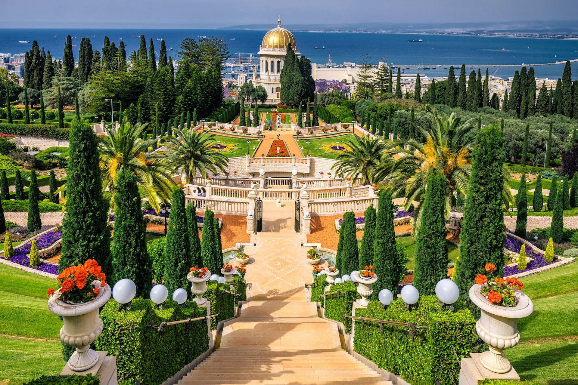 Bahai gardens and temple on the slopes of Mt Carmel and view of the Mediterranean Sea and bay of Haifa, Israel. Image by Ruslan Kalnitsky / Shutterstock