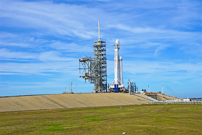 Features - spacex-falcon-lonely-planet-watch-shuttle-launch-b1508b9159b4 spacex shuttle on the launchpad in Florida, with sunny blue skies; how to experience a rocket launch on Florida's Space Coast