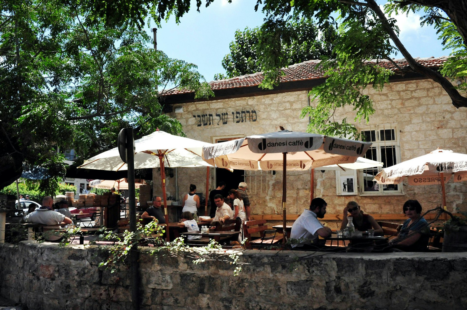 Visitors in local restaurant in Zichron Ya'akov. Image by ChameleonsEye / Shutterstock