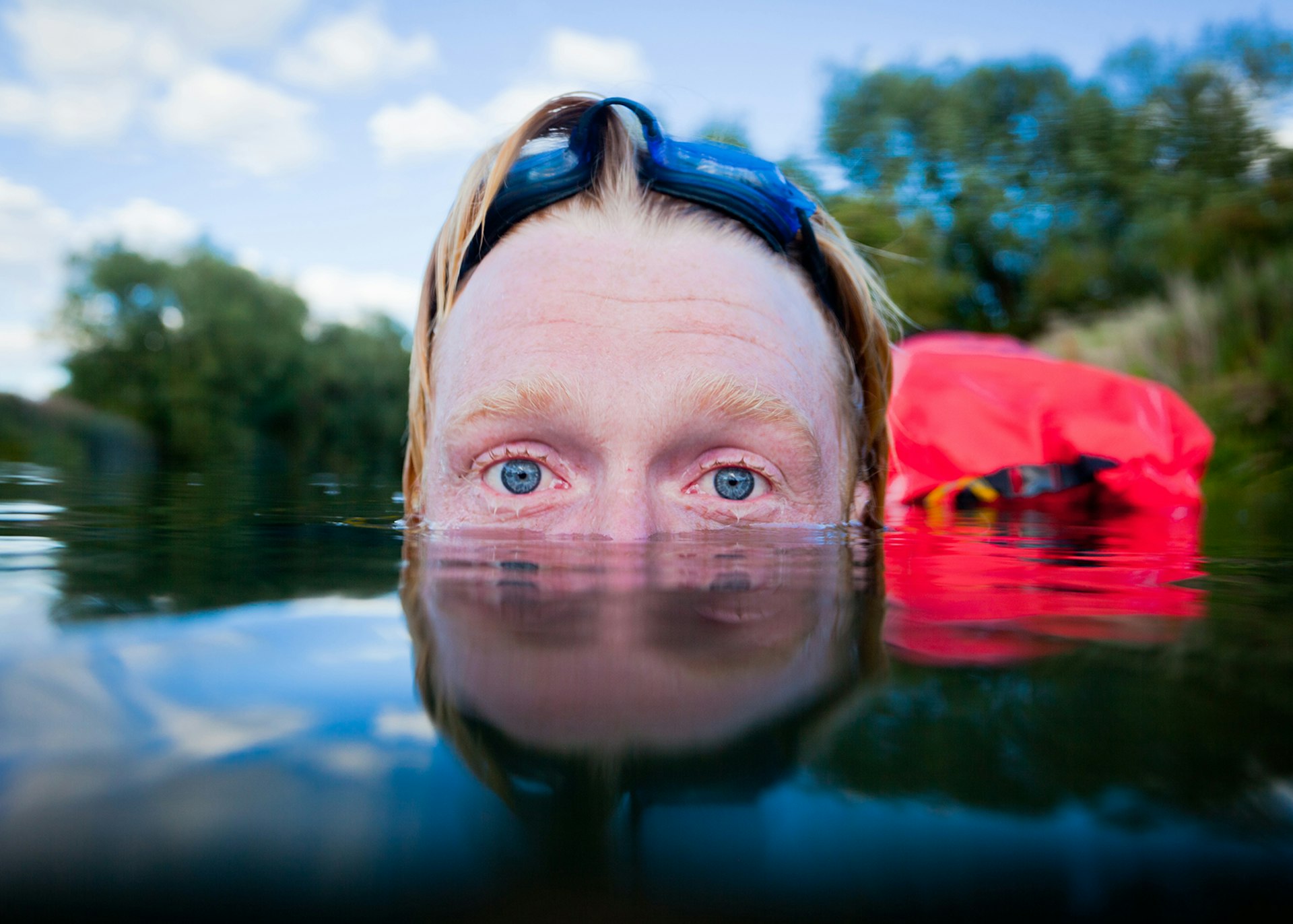 Alastair Humphreys wild swimming in a river @ Alastair Humphreys