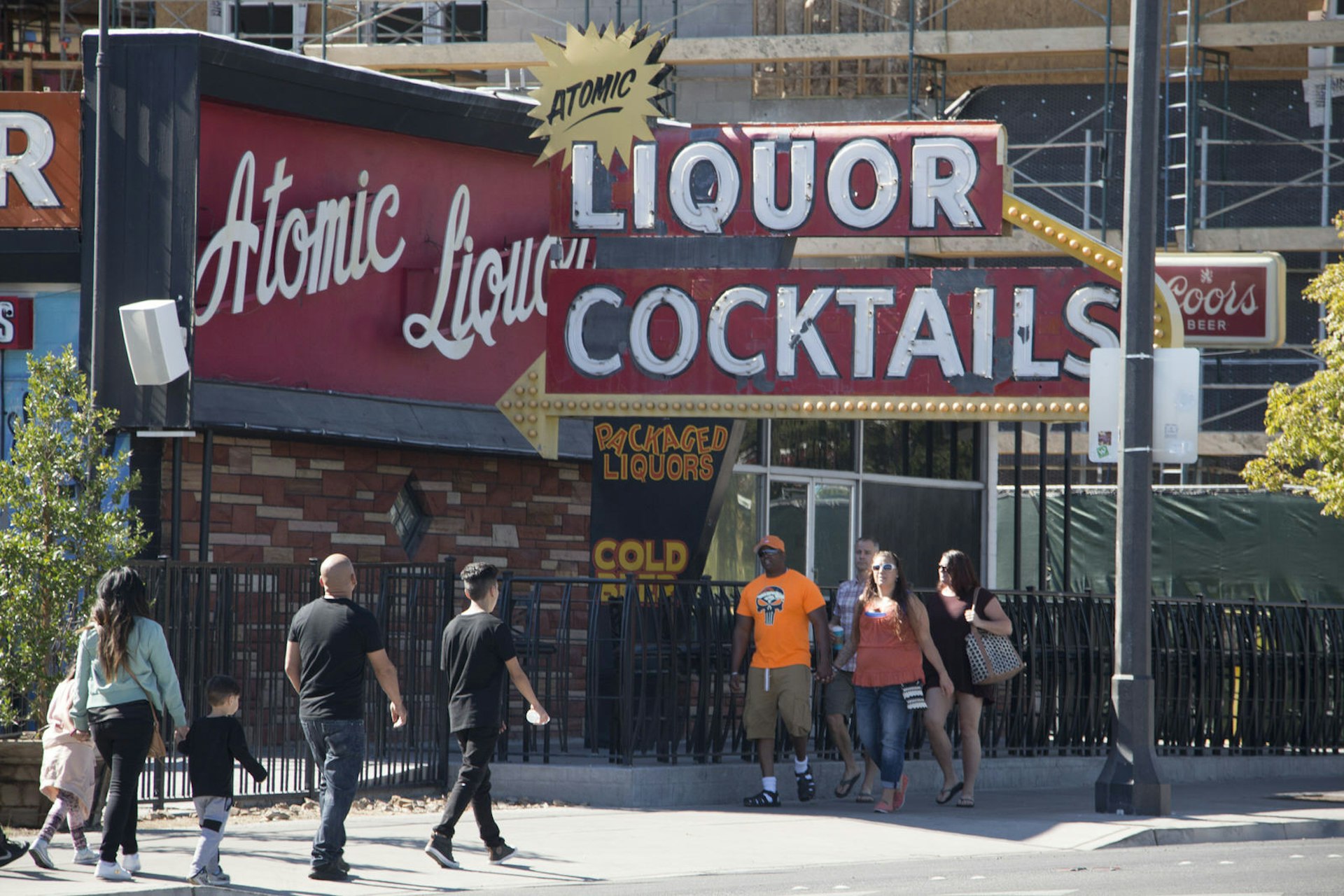 The retro-looking facade of Atomic Liquors in Las Vegas features red, white, and yellow all over its signage © Greg Thilmont / Lonely Planet