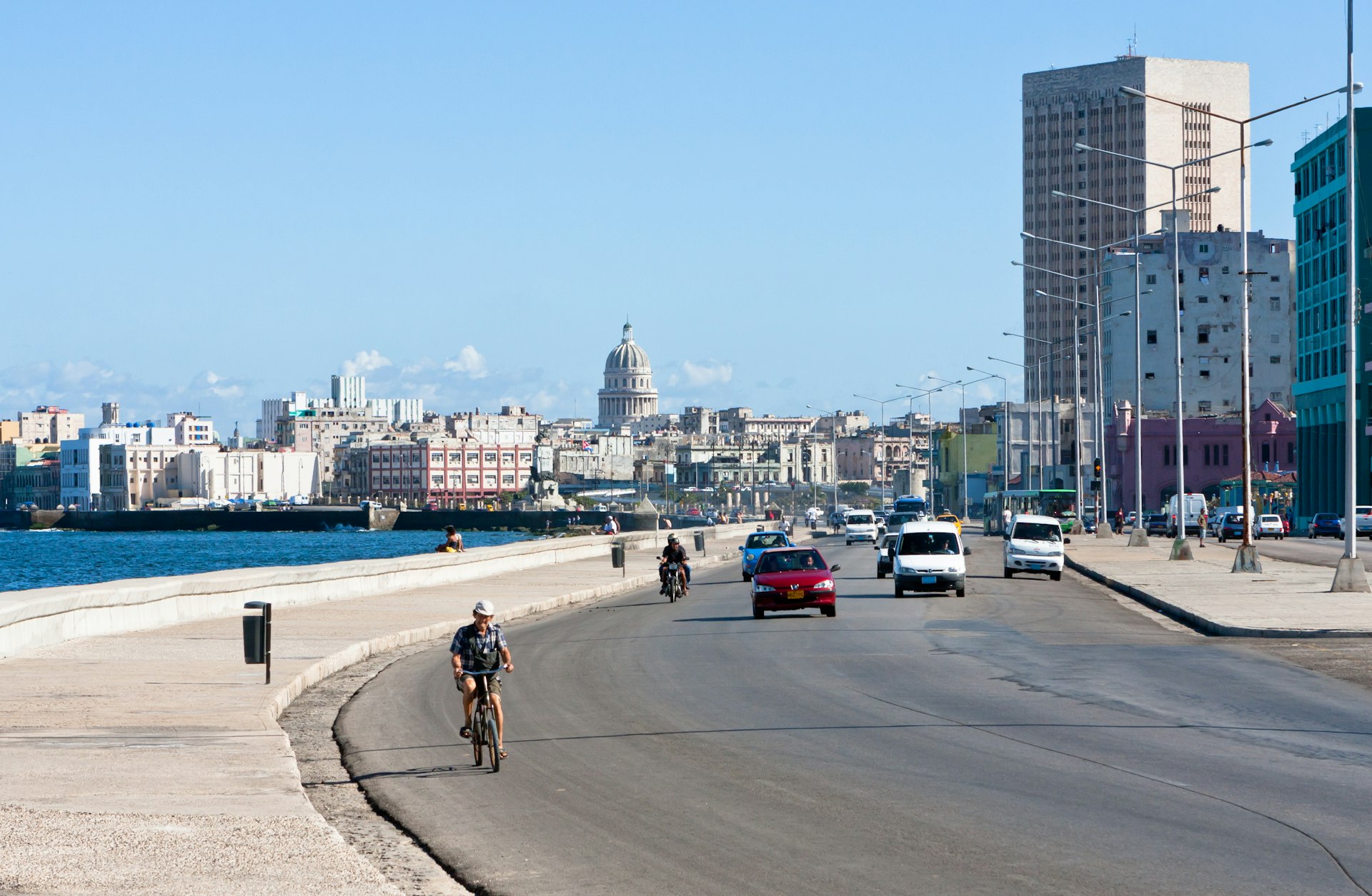 The malecon provides the perfect route for bikers to tour Havana. 
