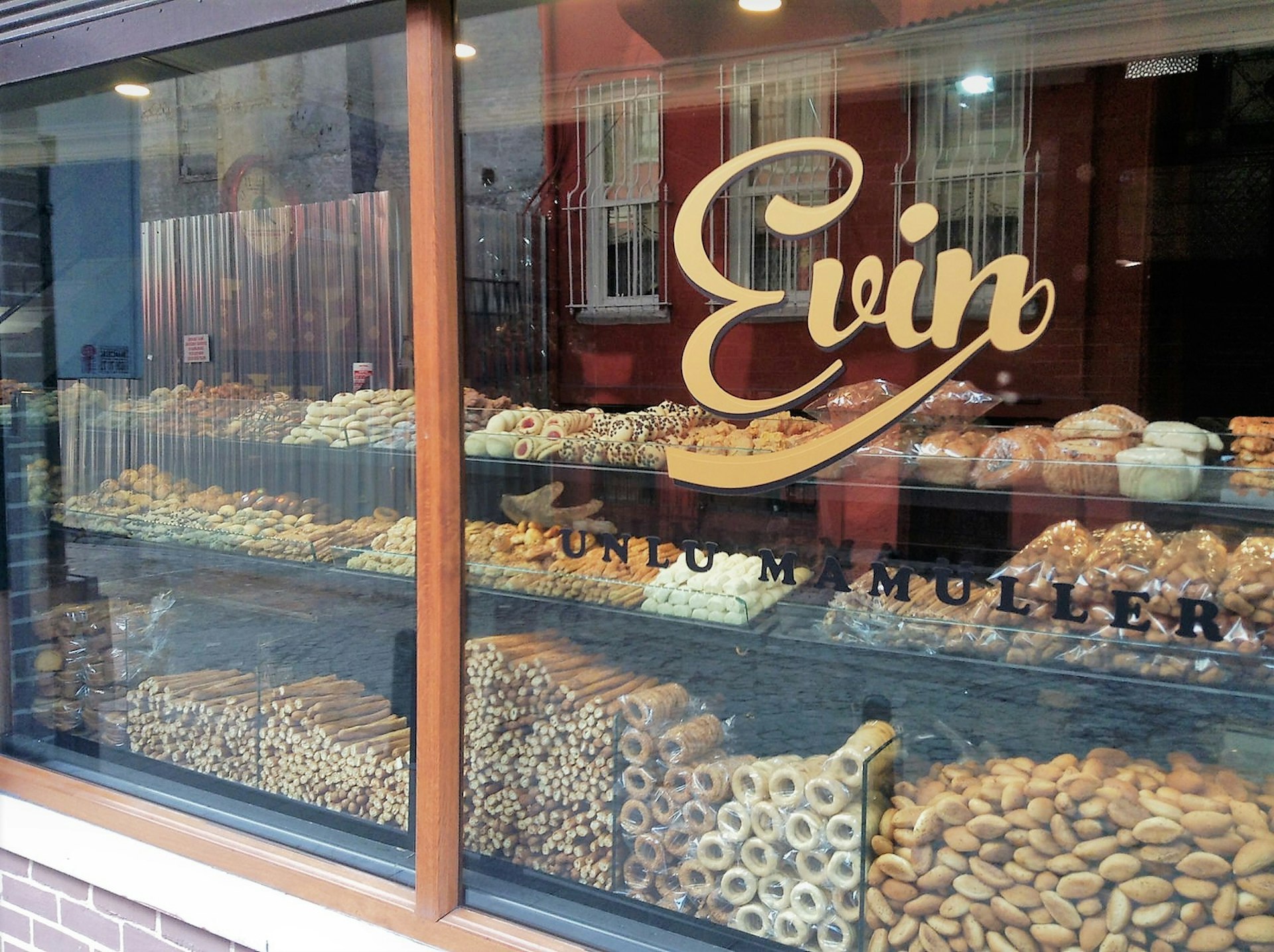 Evin Bakery's window chock-a-block with classic Turkish pastries © Jennifer Hattam / Lonely Planet
