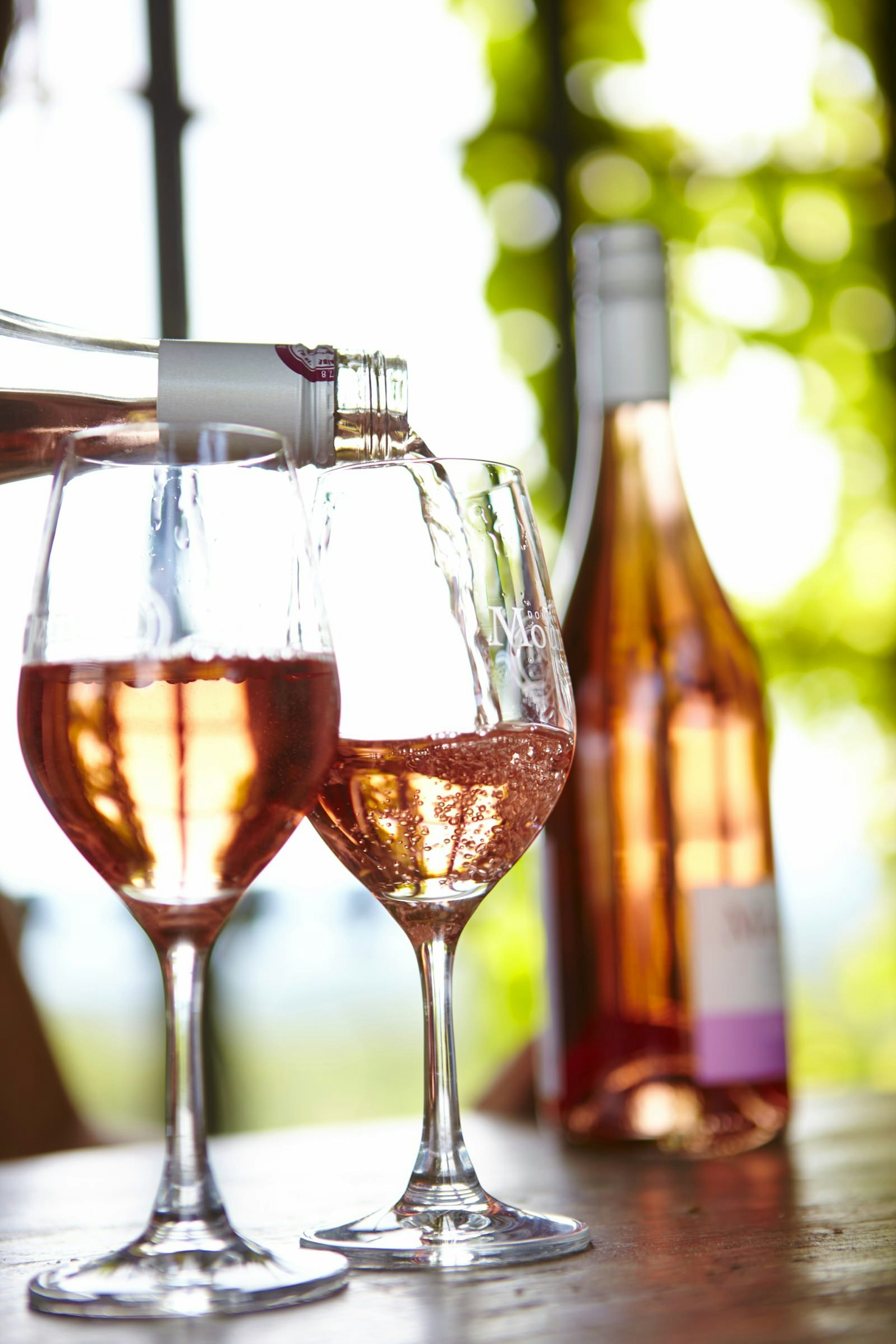 Glasses of Domaine de Mourchon rosé being poured at a Provence vineyard