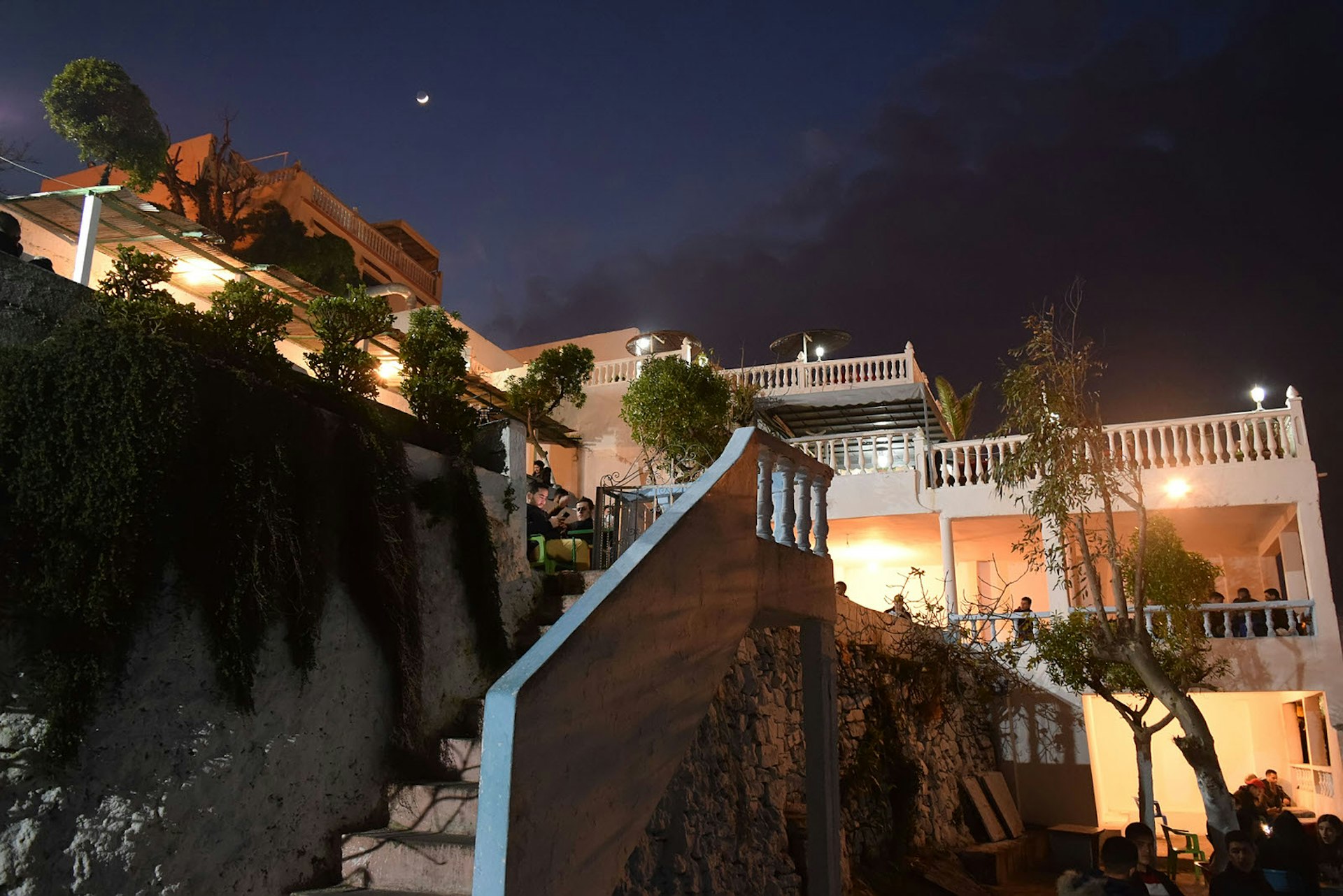 Café Hafa at night, Tangier, Morocco. Image by Jessica Cherkaoui / Lonely Planet