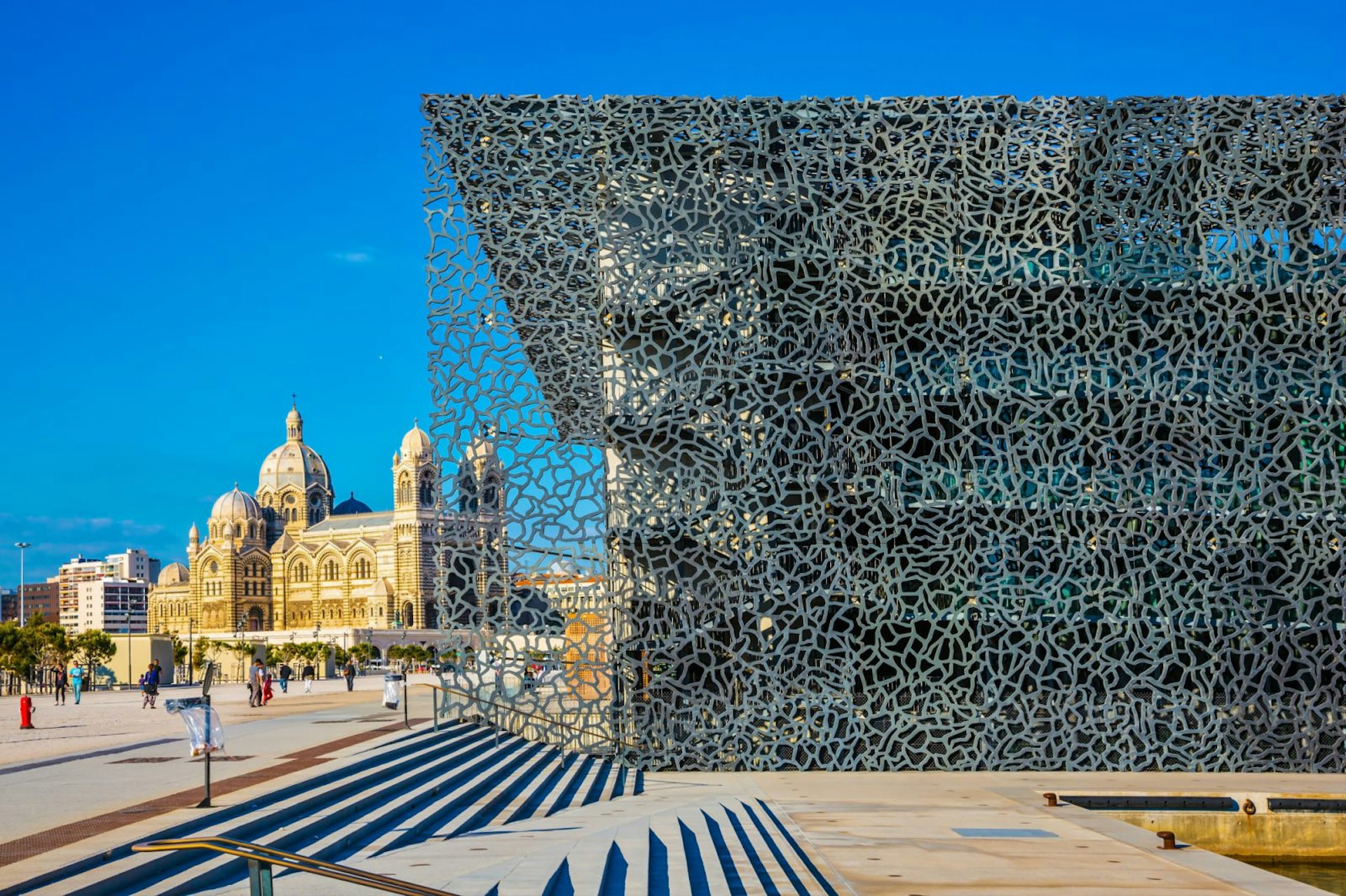 The old Cathedral and a modern building on the waterfront of Marseille