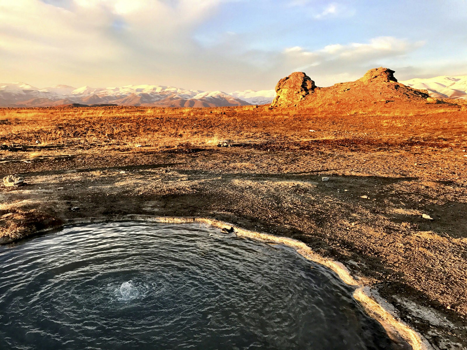 Volcanic pools bubble up near Solomon's Prison © Steve Waters / Lonely Planet