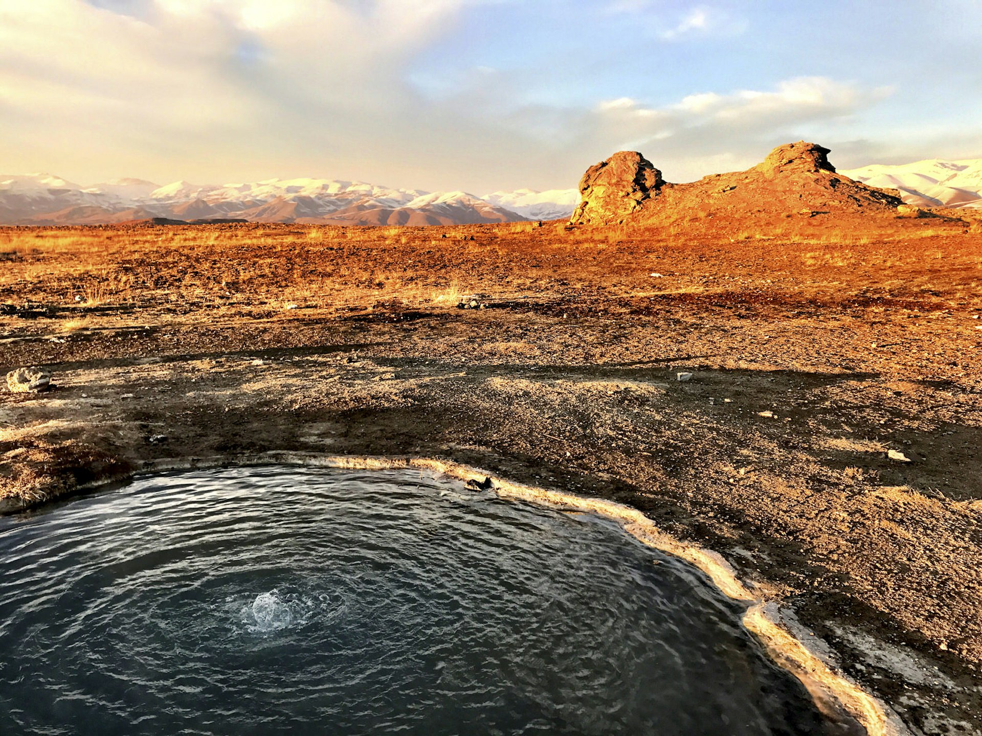 Volcanic pools bubble up near Solomon's Prison © Steve Waters / Lonely Planet