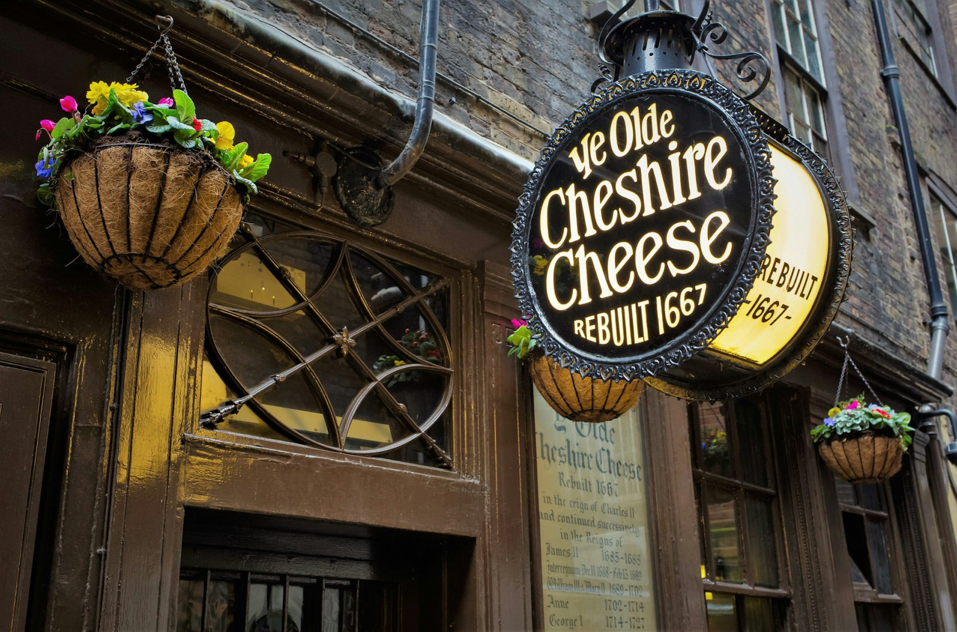 Exterior signage of Ye Olde Cheshire Cheese pub in London