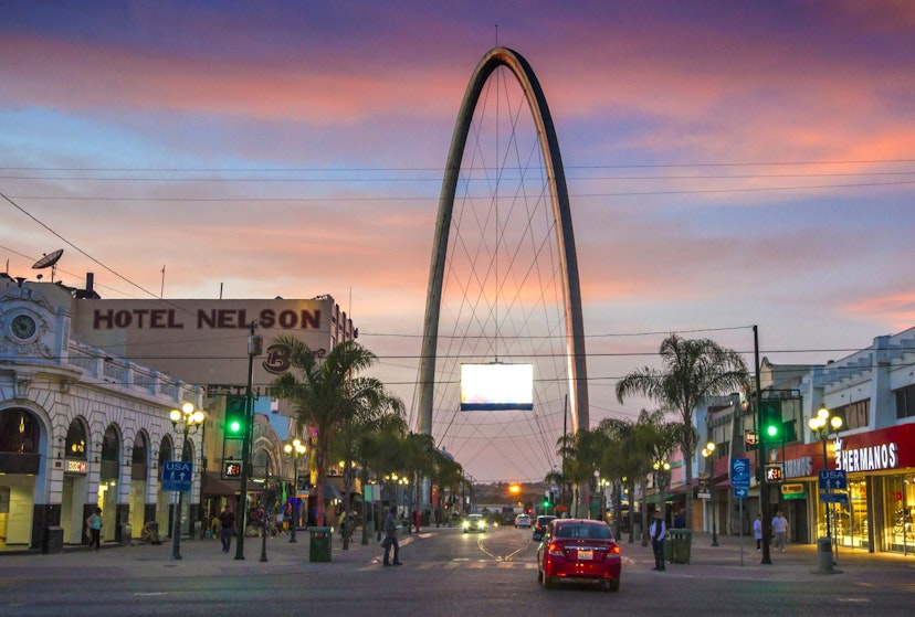 Avenida Revolucion, the main touristic artery in Tijuana with the millennial arch in a perspective © Denis Kabanov / Getty Images