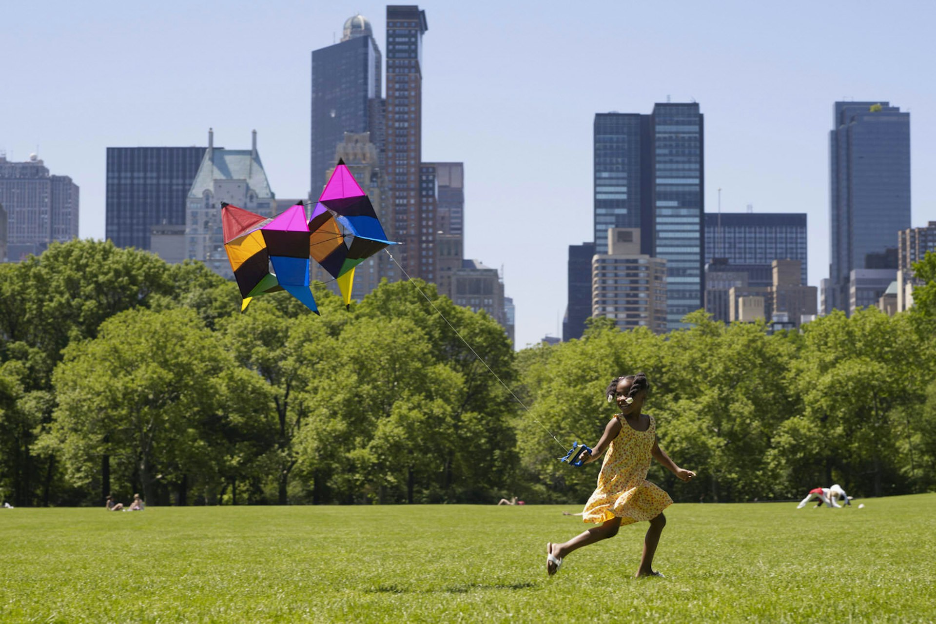 A little girl flies a kite in Central Park © Granger Wootz / Getty