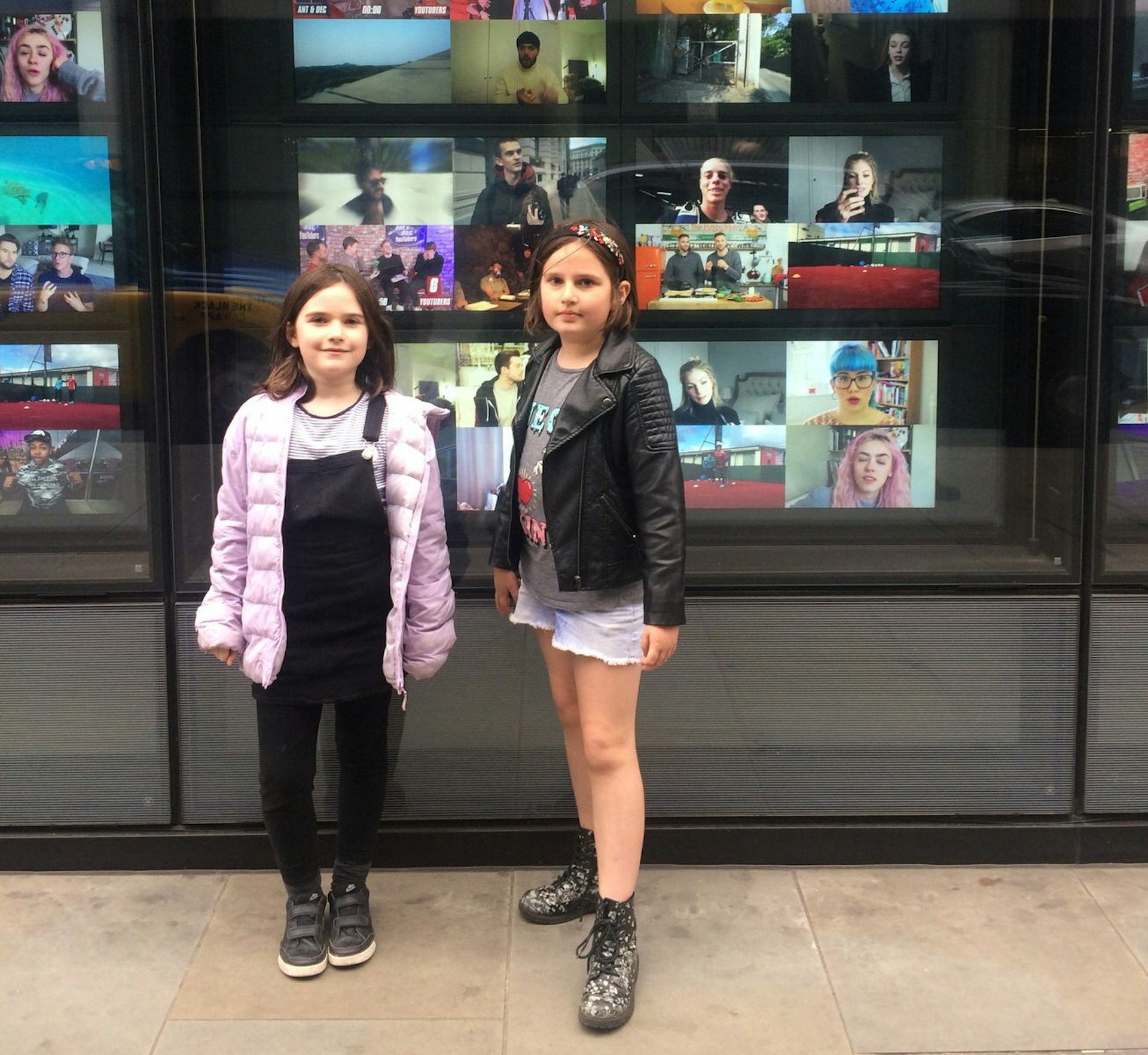 Tasmin's guides pose in front of the YouTube Creator Space in central London © Tasmin Waby / Lonely Planet