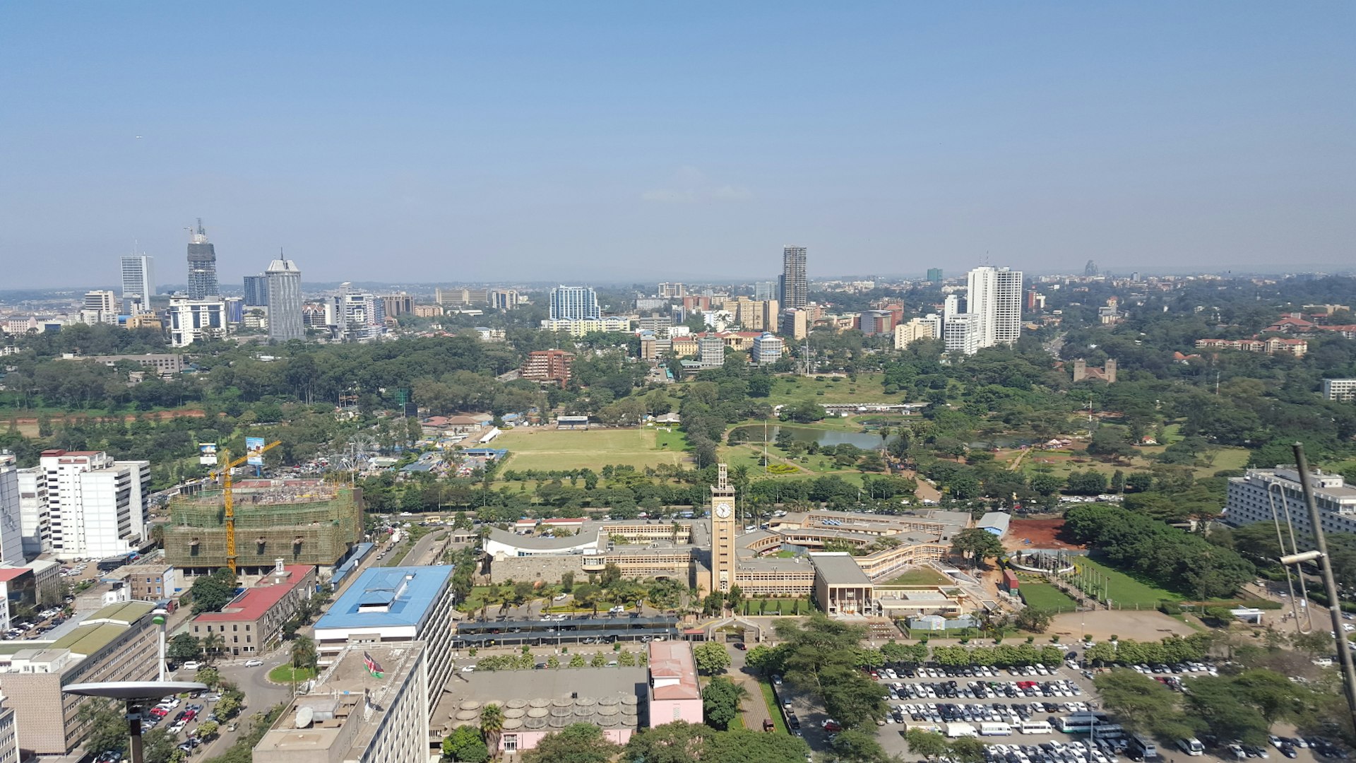 Looking down over green parks and low-rise buildings in central Nairobi from the Kenyatta International Conference Centre© Clementine Logan / Lonely Planet