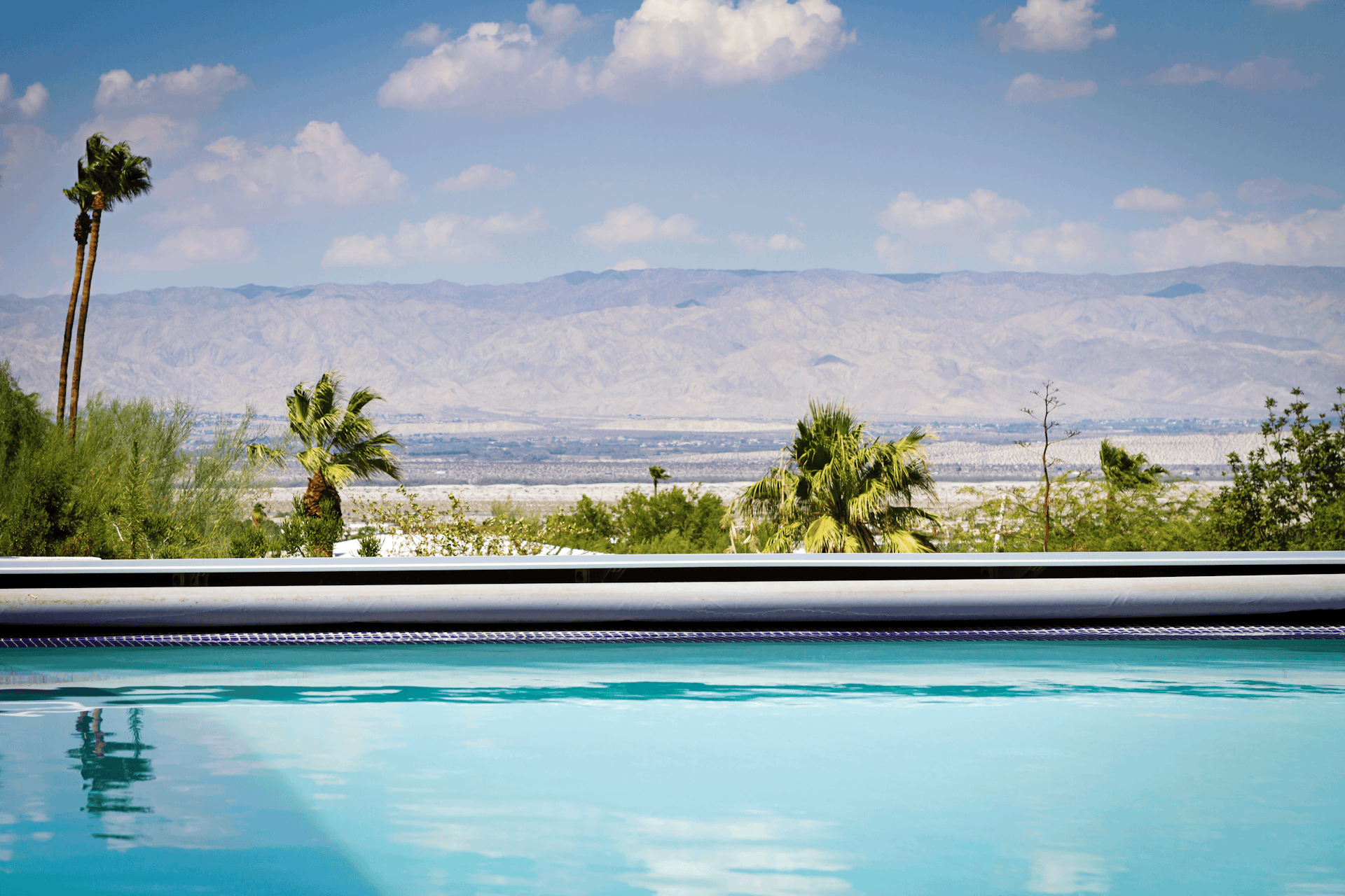 Horizontal swimming pool with a view of the mountains © jodie johnson / getty images