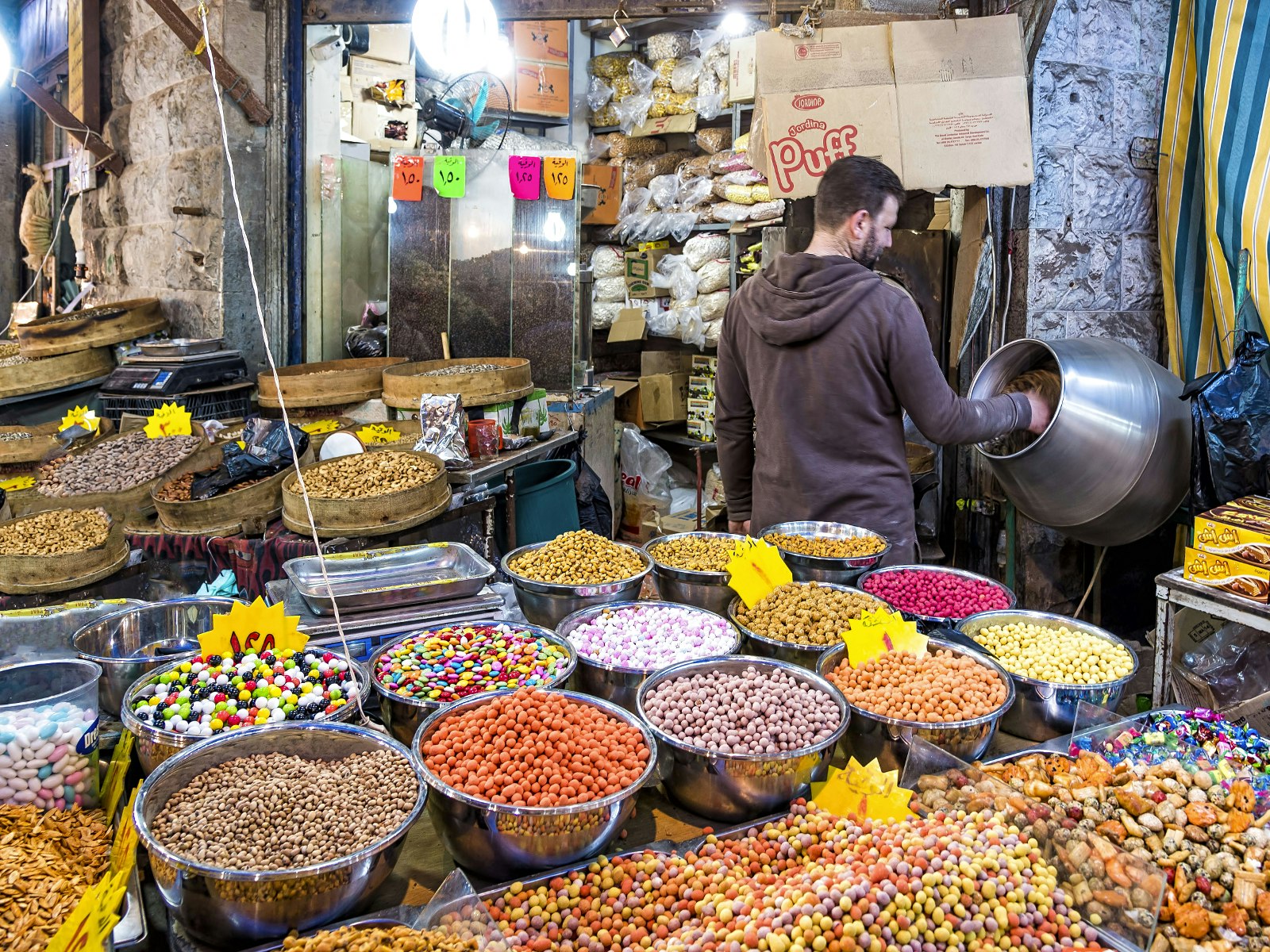 A plethora of colourful sweets on display a a sweet shop in Amman, Jordan