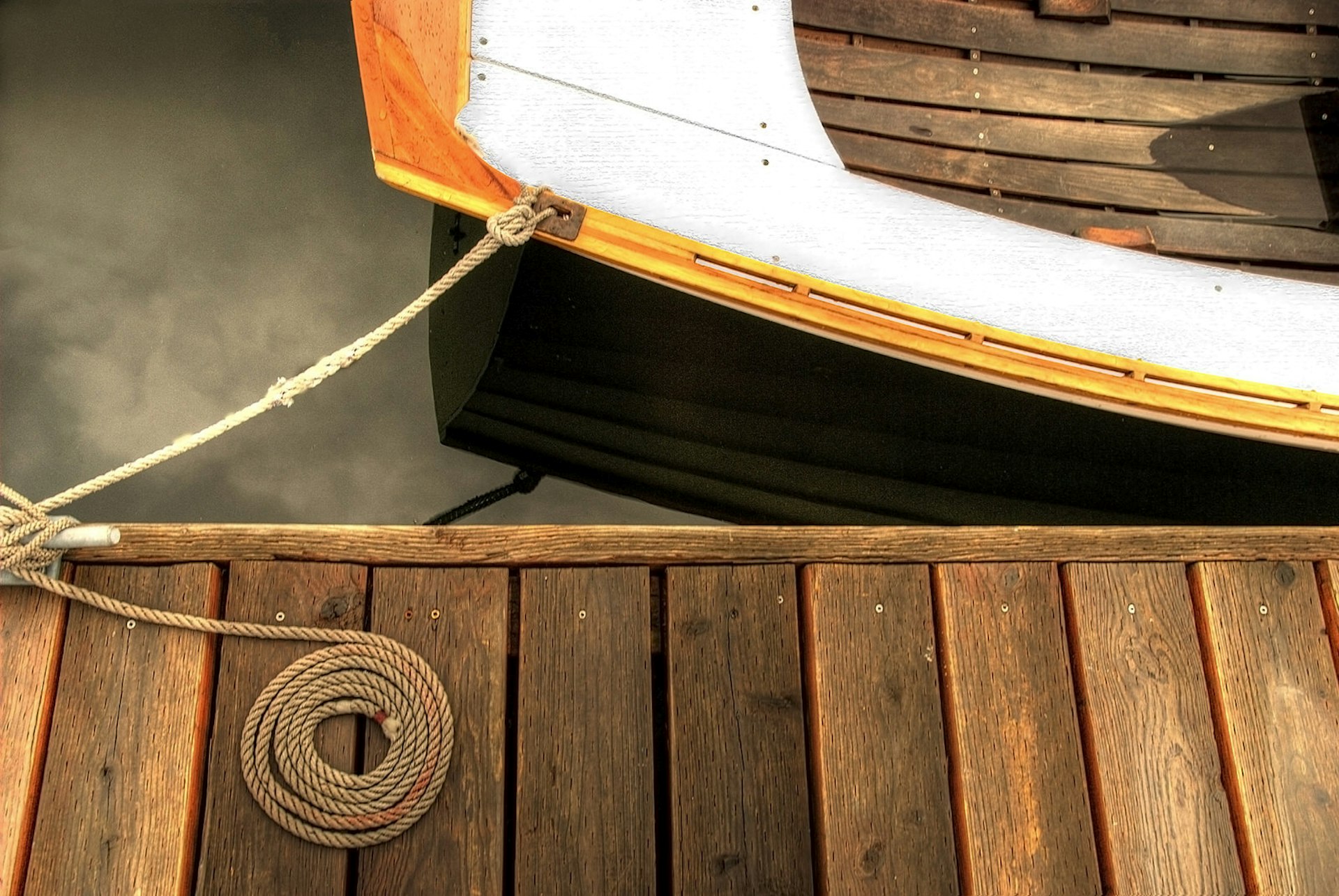 A wooden rowboat is tied to a dock at Seattle's Center for Wooden Boats © Bill Hinton / Getty Images