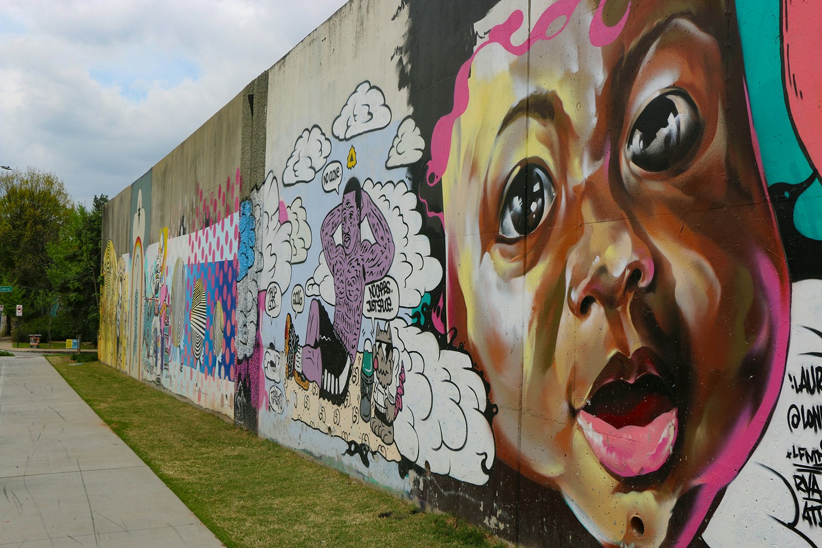 mural with image of child against a colorful background