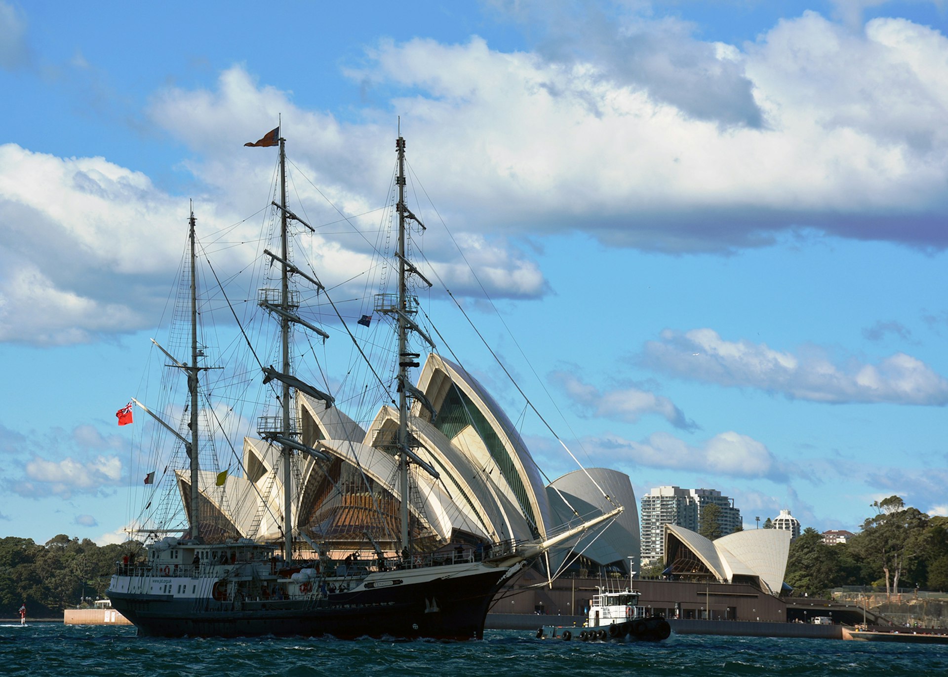 The SV Tenacious in front of the Sydney Opera House / Image courtesy of the Jubilee Sailing Trust