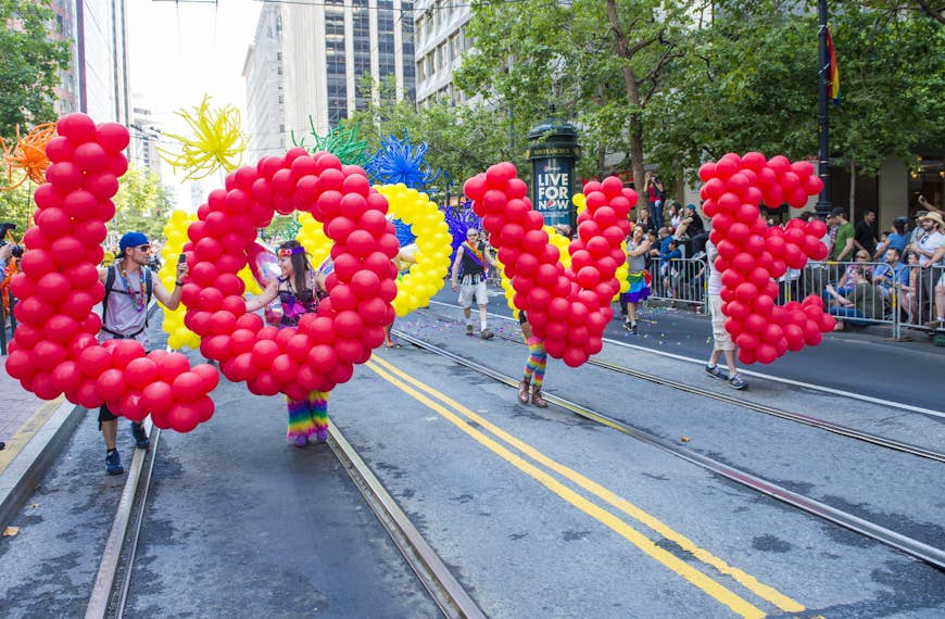 Pride in the US: Parade participants carry balloons to spell out 'LOVE' © Kobby Dagan / Shutterstock