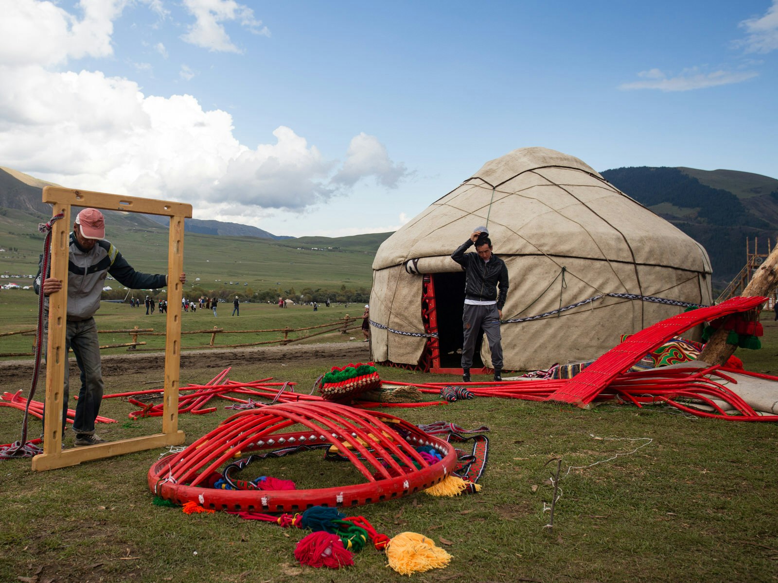 Yurt-builders practice for the timed yurt-building contest at Kyrchyn Jailoo © Stephen Lioy / Lonely Planet