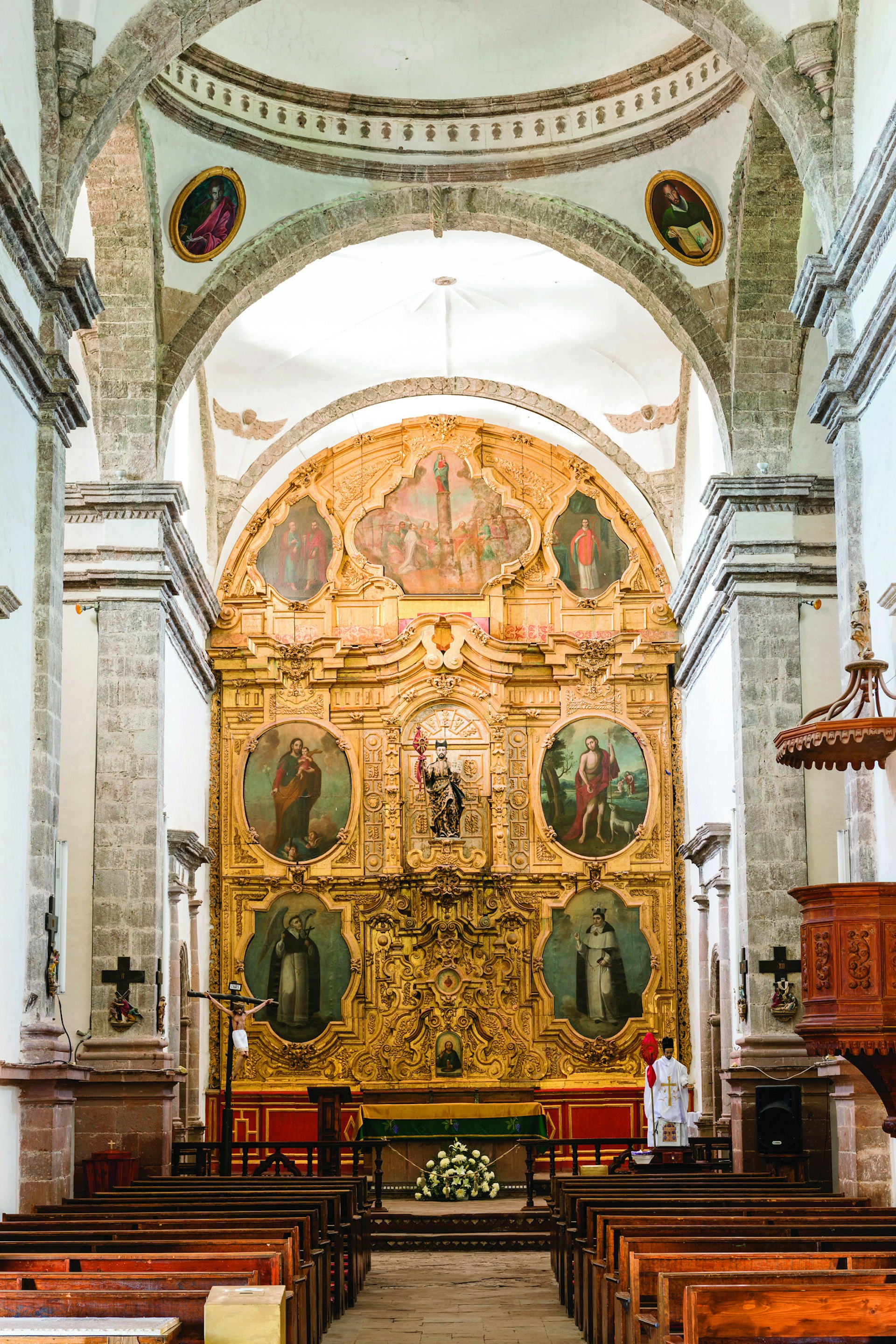The Baroque retablo behind the altar in the Mision de San Ignacio