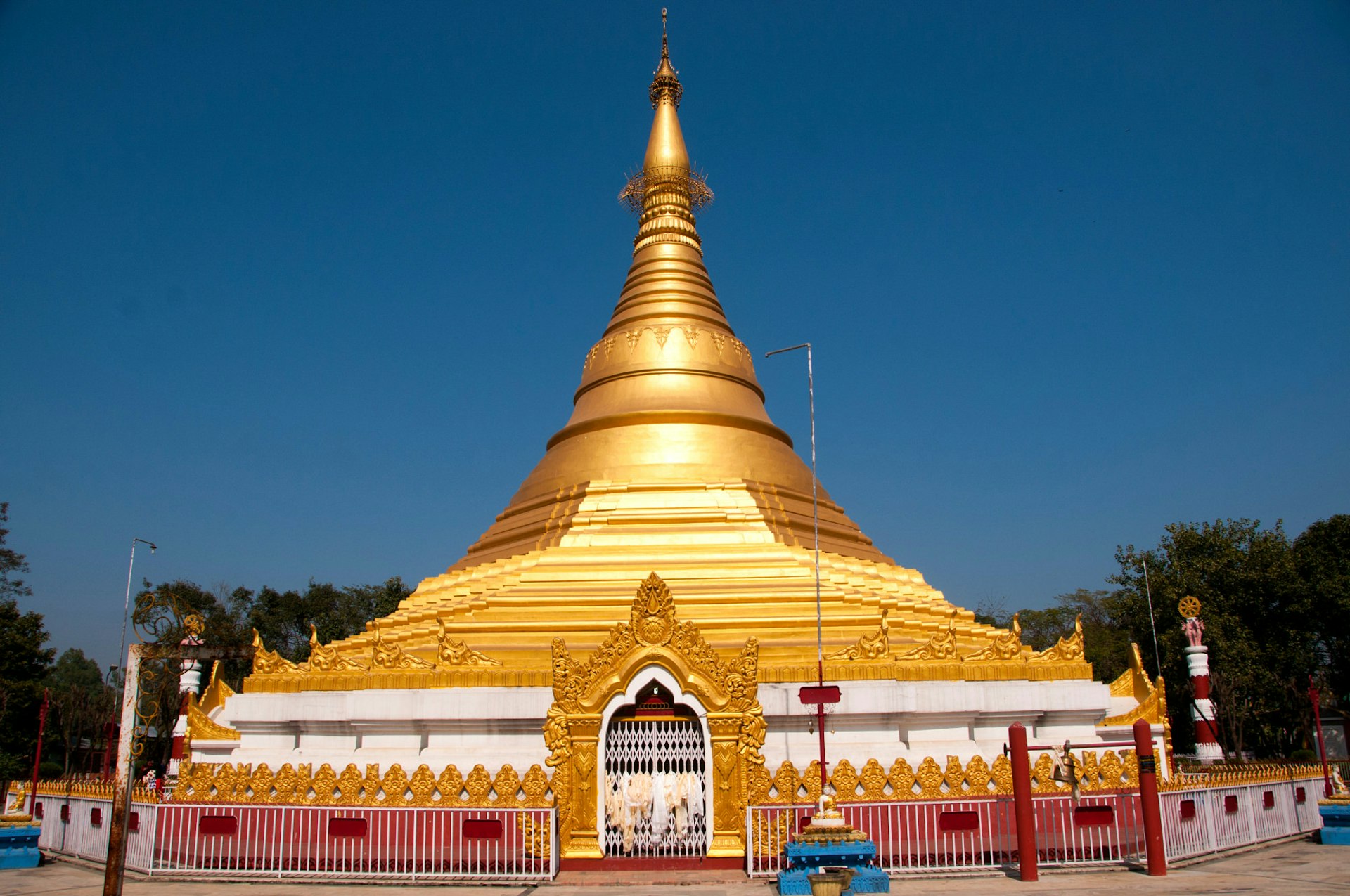 Myanmar Golden Temple's large golden roof glistens in the sun