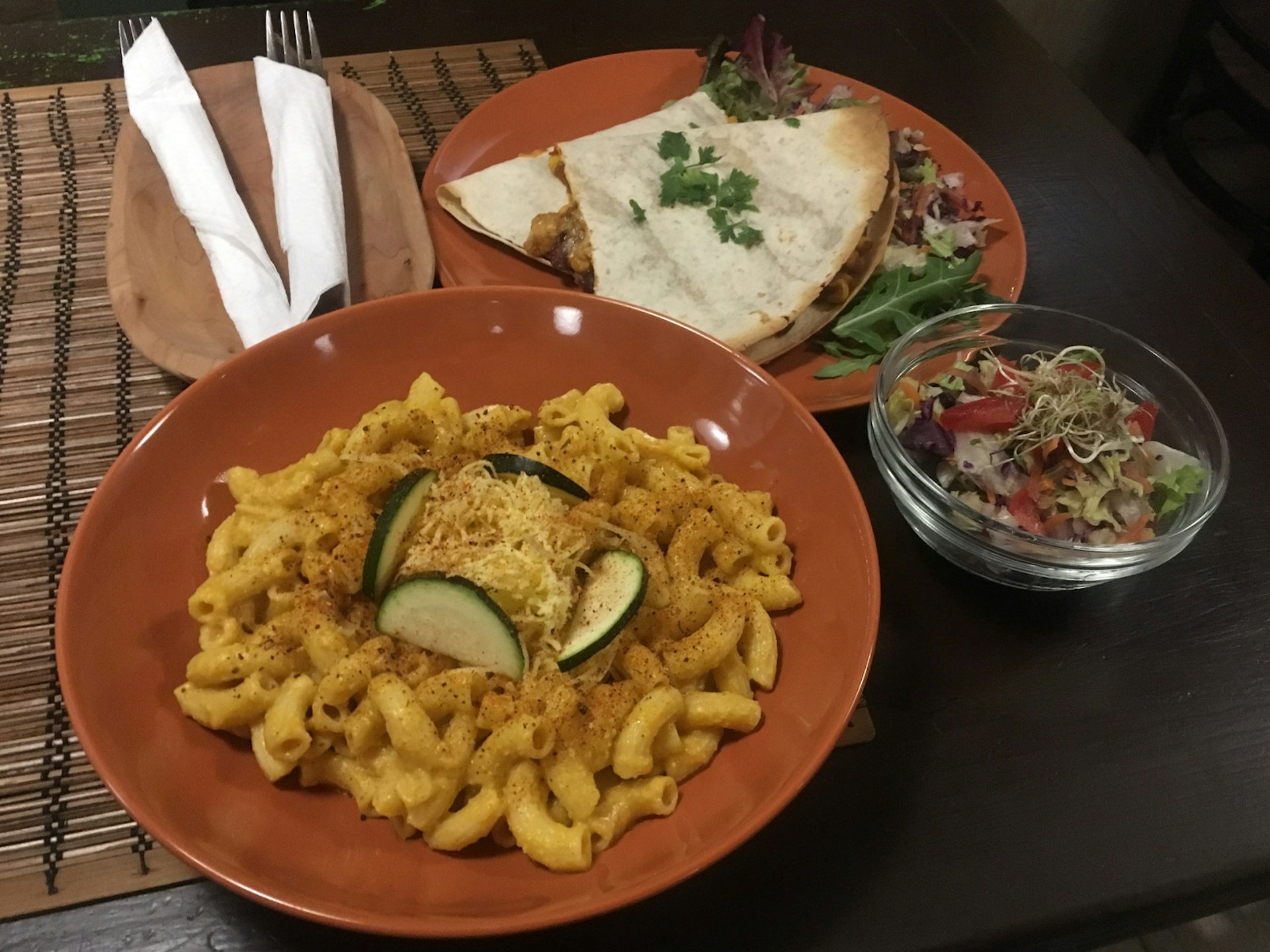 Vegan macaroni and cheese and quesadilla served at Koszmosz restaurant © Jennifer Walker / Lonely Planet