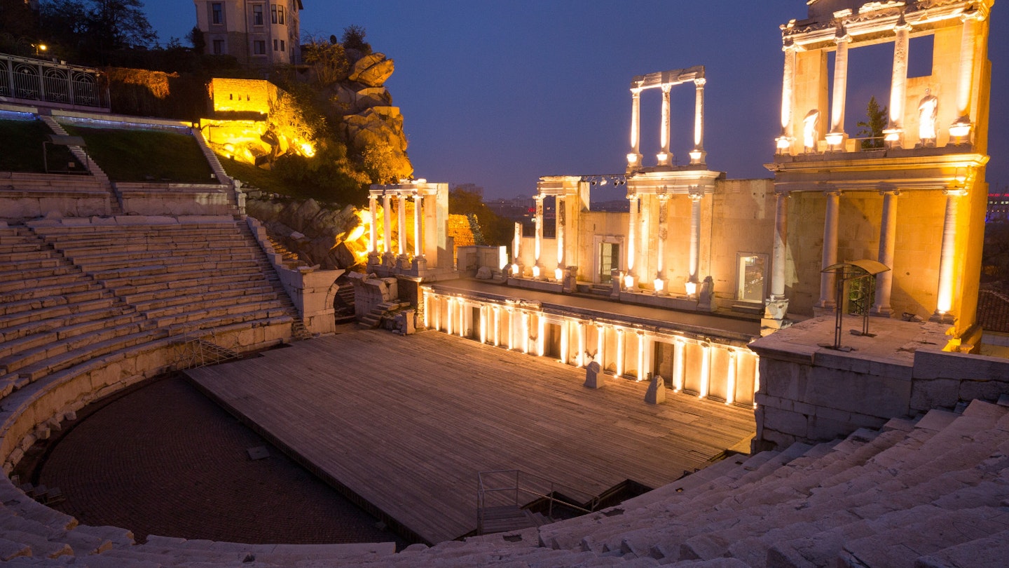 Illuminated ancient amphitheatre of Philippopolis in Plovdiv © Nickolay Kunev / 500px