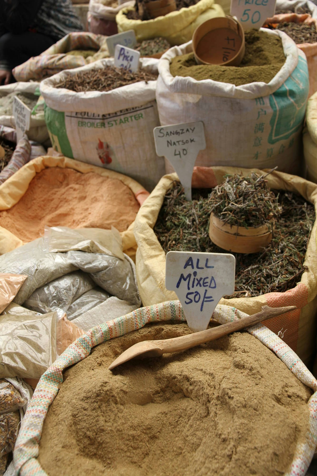  Powdered incense for sale at Thimphu’s Weekend Market © Bradley Mayhew / Lonely Planet