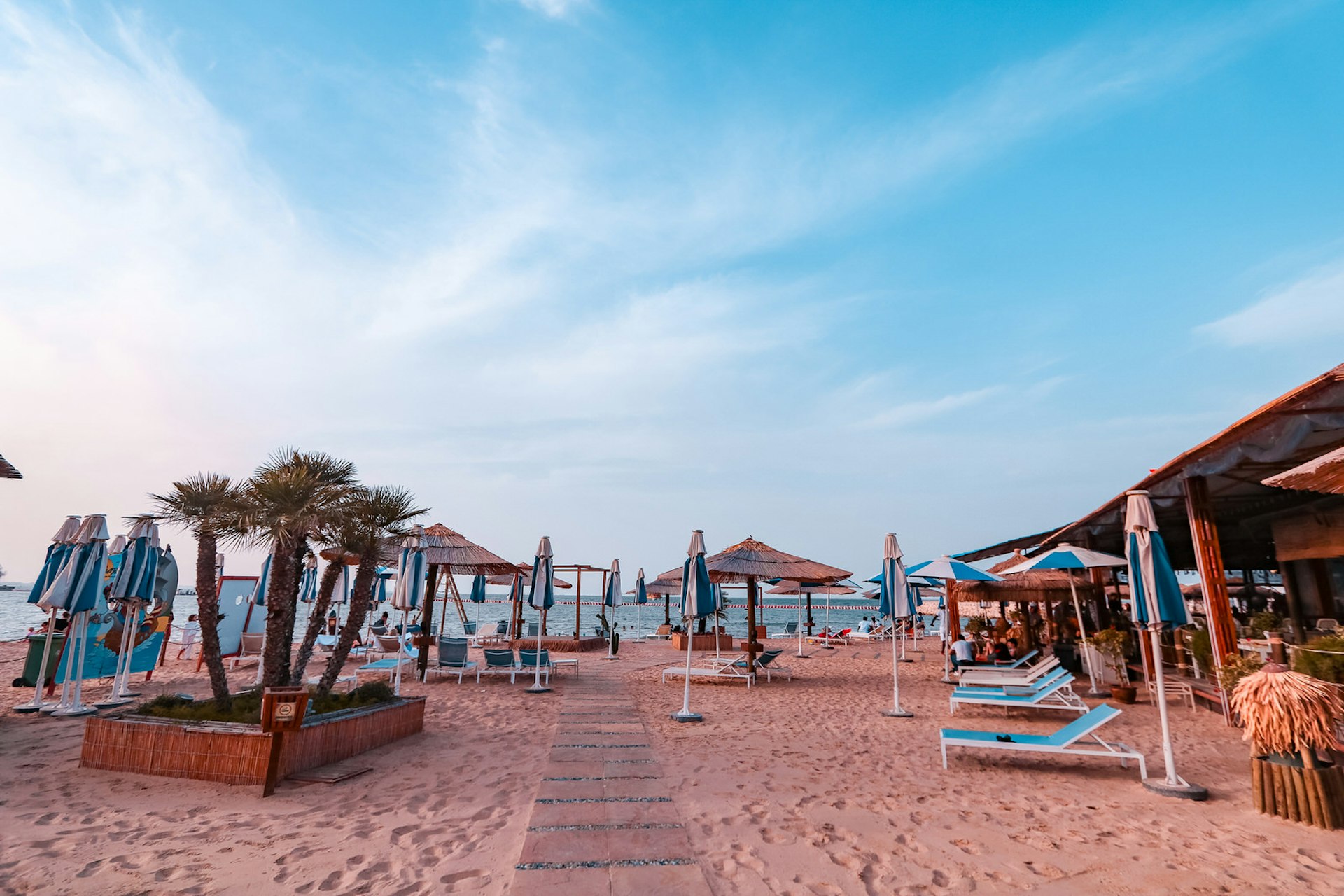 Chairs along the beach at TaliaMare Beach Club, Doha, Qatar © Polly Byles / Lonely Planet
