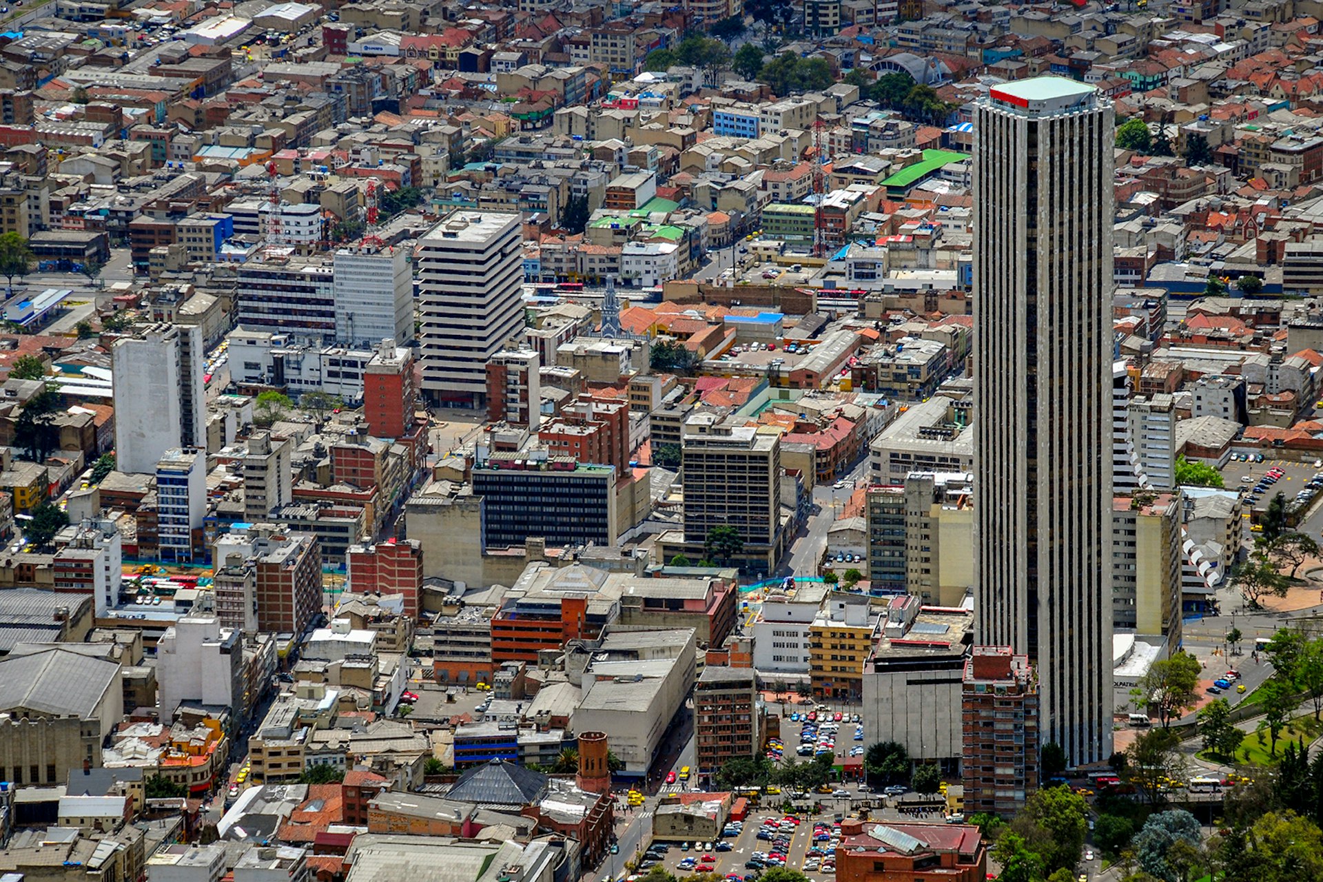 Aerial view of Bogota cityscape, with Colpatria Tower rising high above the other buildings © Mtcurado / Getty Images