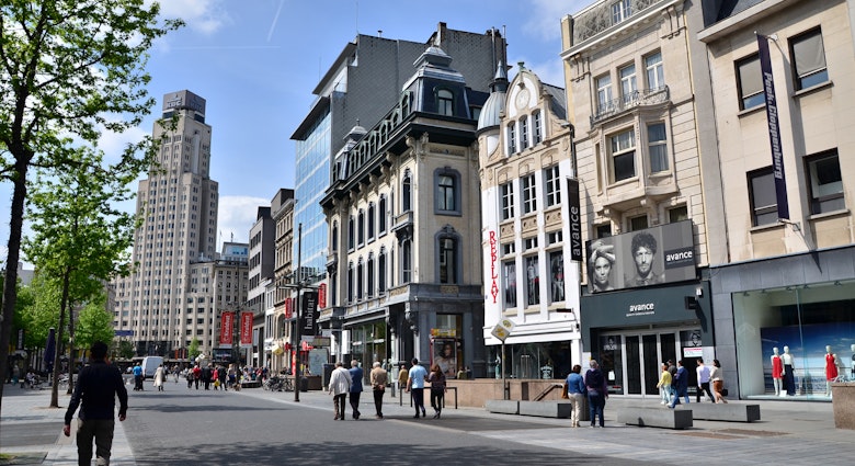 Features - Tourist on The Meir, the main shopping street of Antwerp