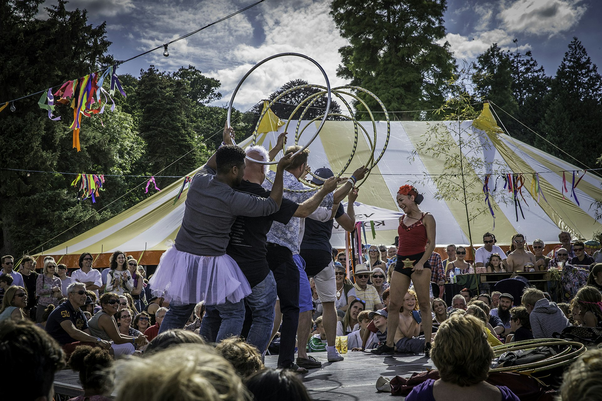 Performers entertaining the crowd at the Port Eliot Festival, Cornwall © Barcroft Media / Getty Images
