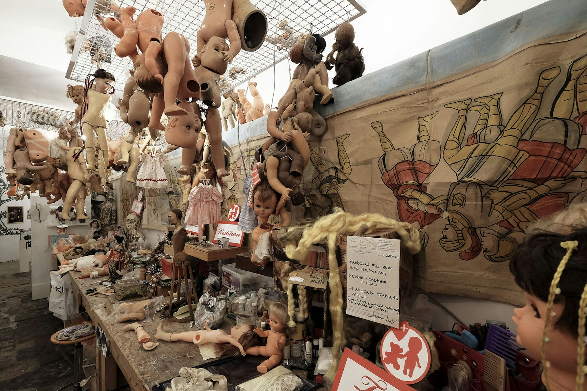 Features - A view of the "Hospital of the Dolls" in downtown Naples.