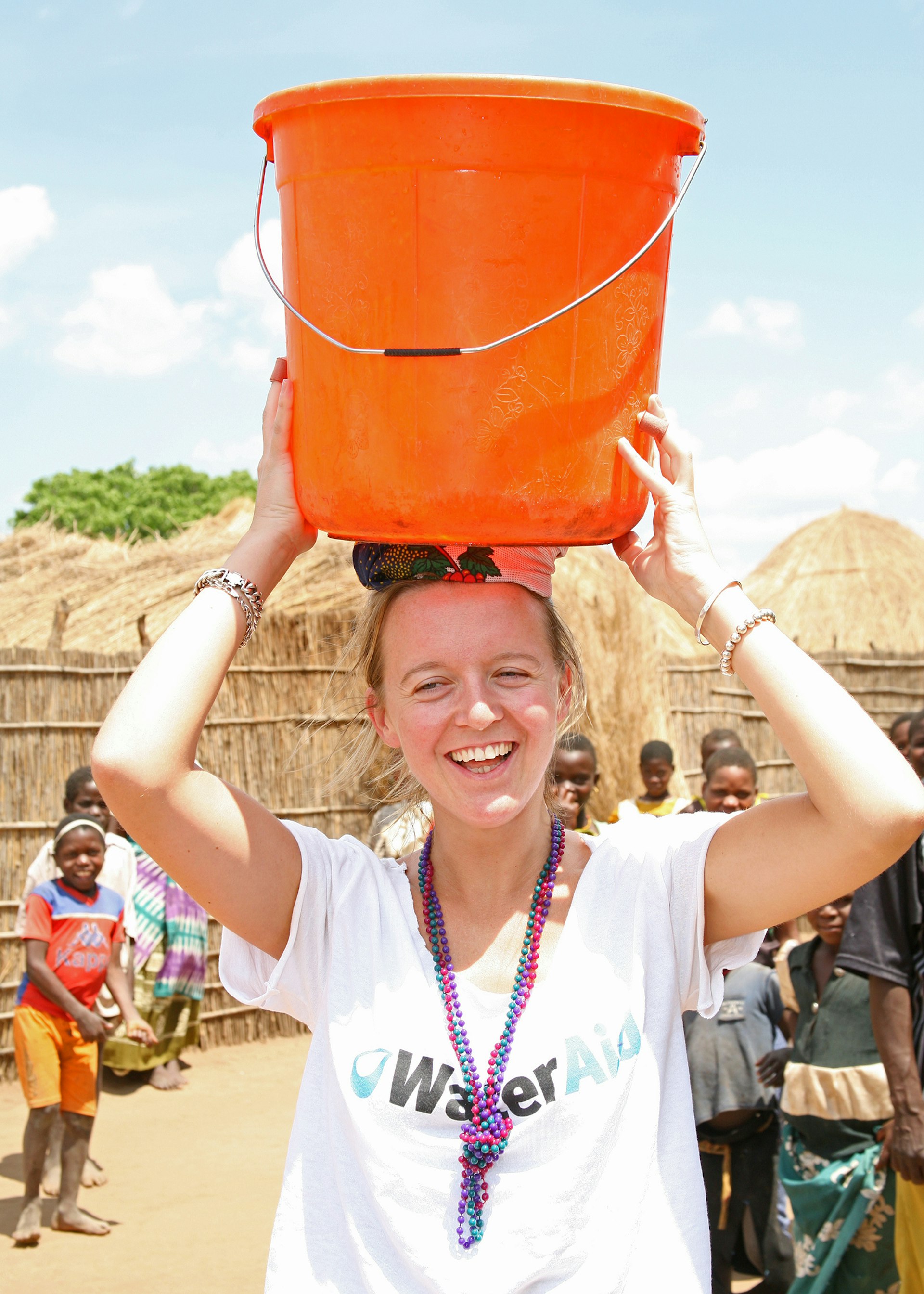 Glastonbury co-organiser Emily Eavis visiting a village in Africa as a representative of the charity WaterAid © Glastonbury Festival