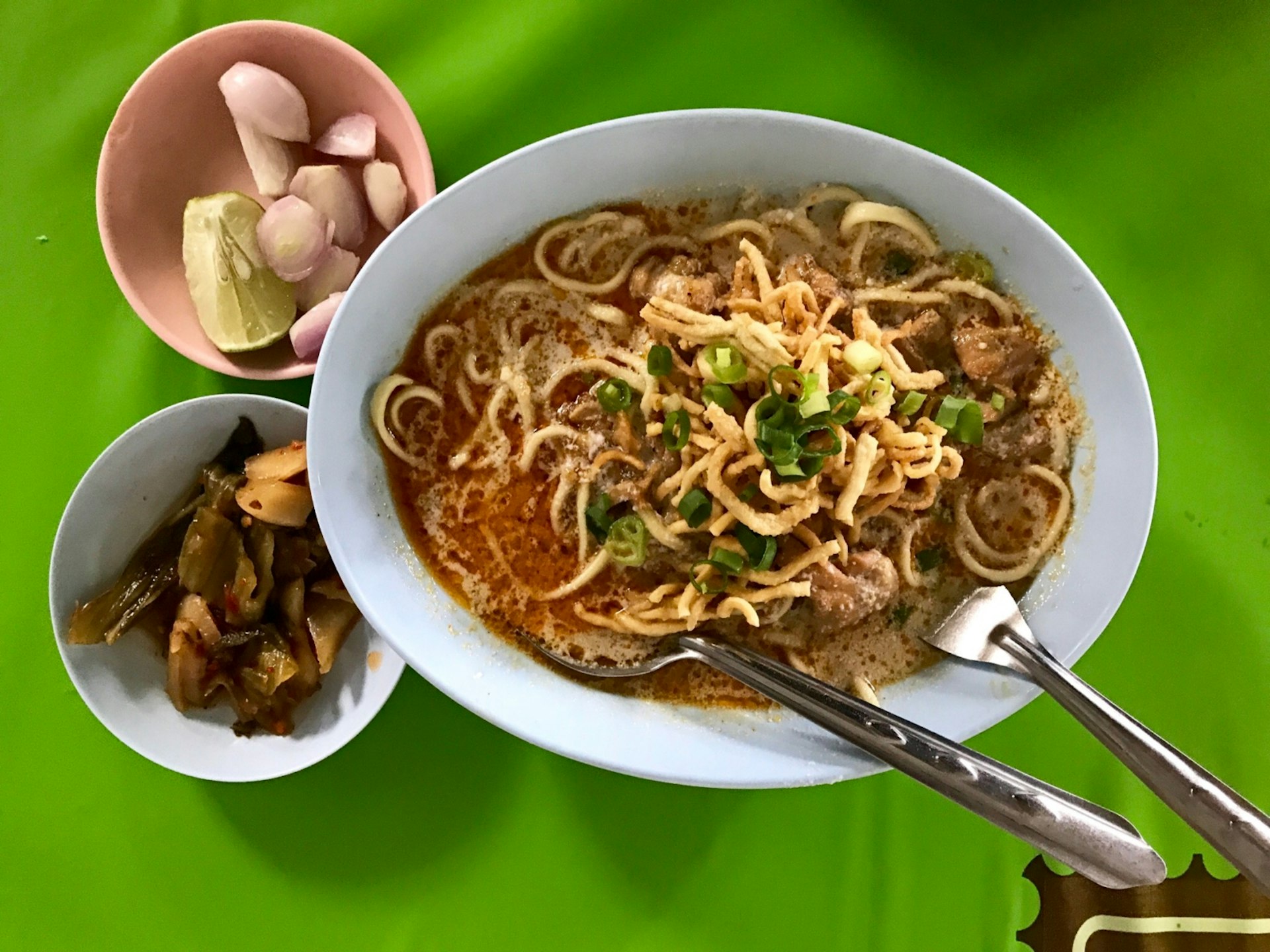 A bowl of kôw soy, Thai Thai curry noodles, served on Halal St in Chiang Mai © Celeste Brash / Lonely Planet