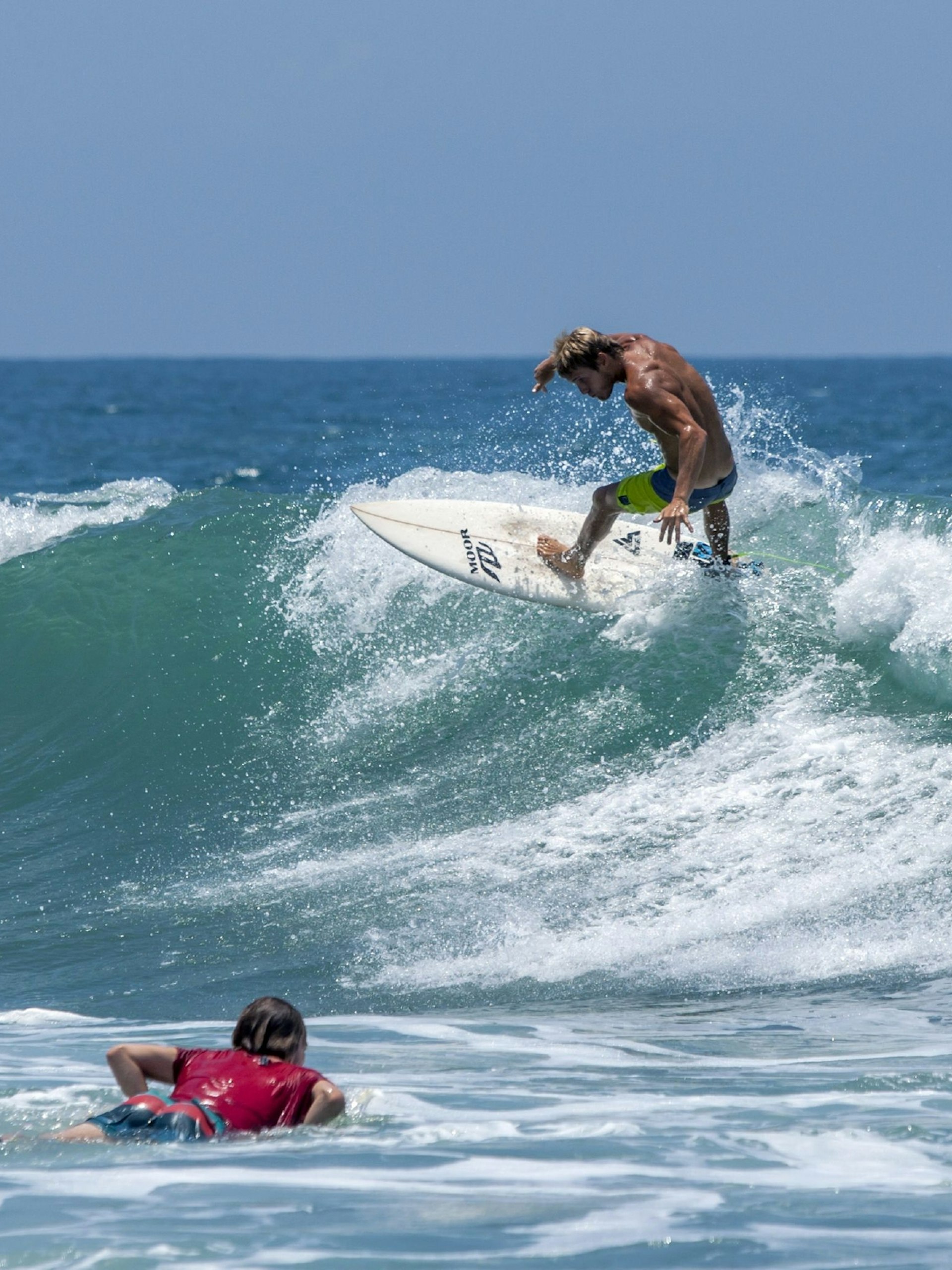 A surfer rides a wave at Arugam Bay's point break ©Thomas Wyness / Shutterstock