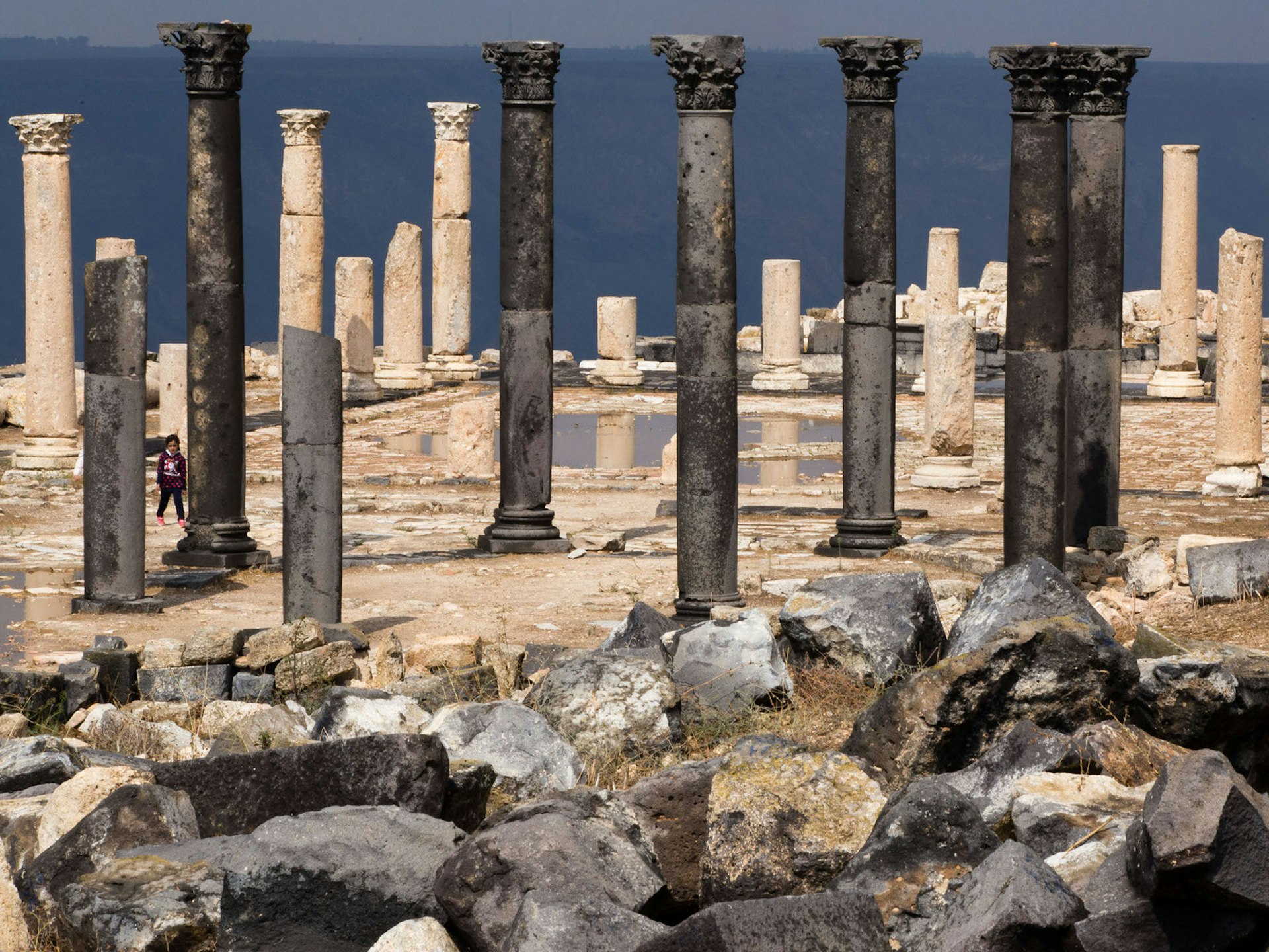 The columns of the Umm Qais ruins in Jordan © Stephen Lioy / Lonely Planet