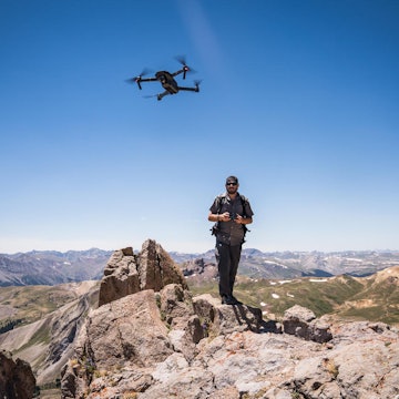 man flies a drone in Uncompagre National Forest