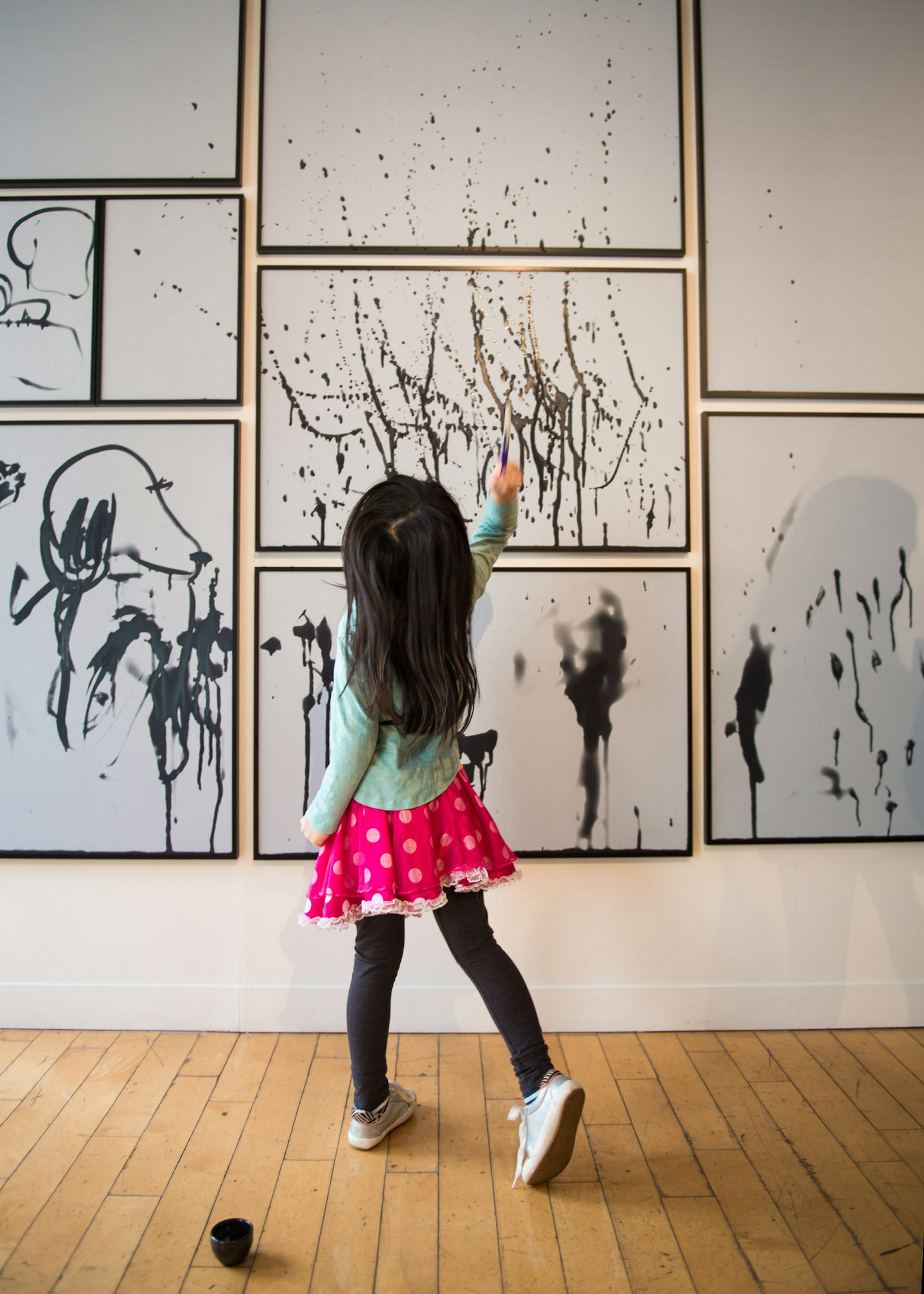 A child draws on the walls at Vancouver Art Gallery – as part of an interactive activity © Anita Bonnarens