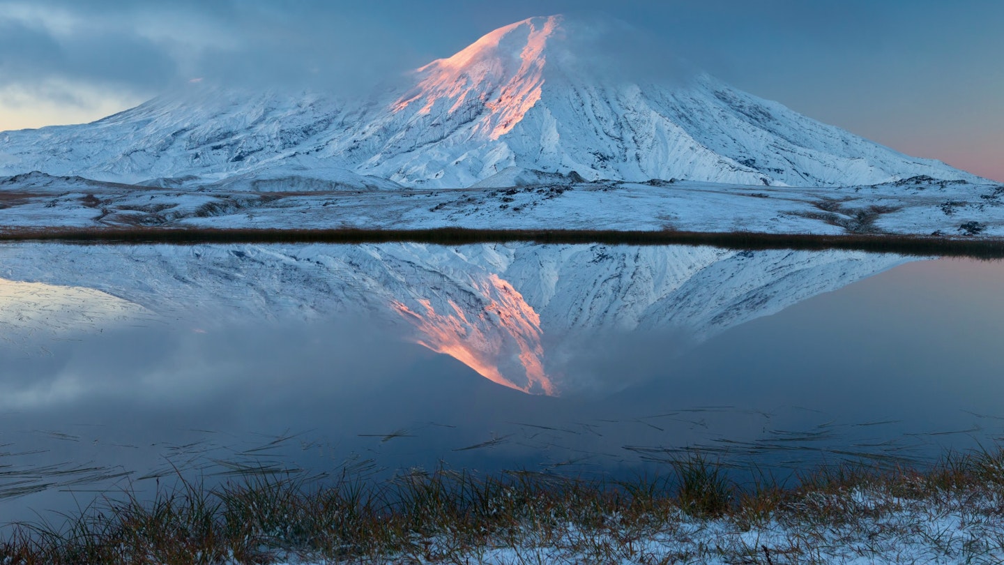 With snowcapped volcanoes, Kamchatka is a place of primal beauty © Sergey Krasnoshchekov / 500px
