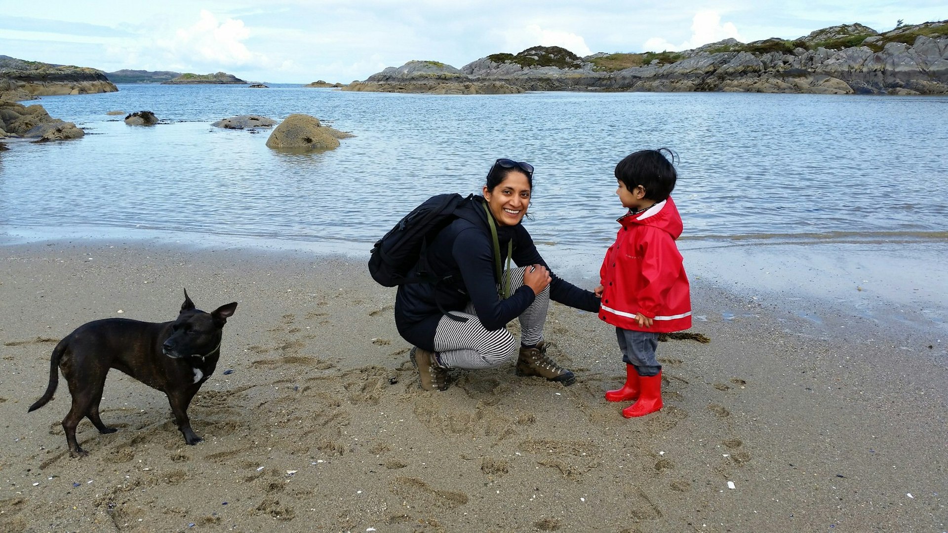 Lonely Planet's Edinburgh Local Chitra, enjoying some family time on the beach © Chitra Ramaswamy / Lonely Planet