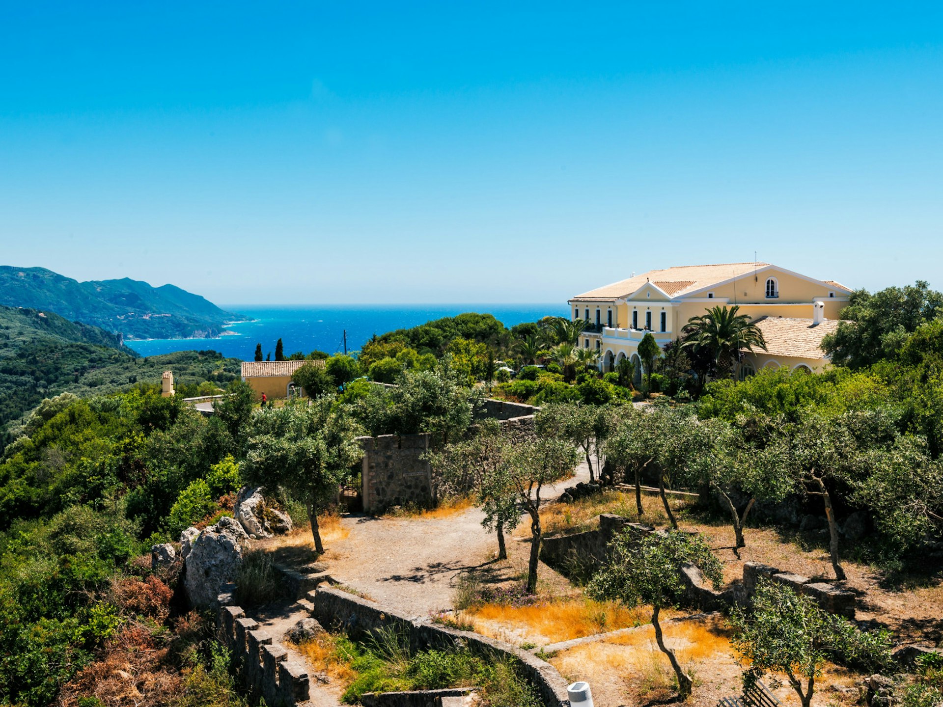 Olive groves dot the landscape near Kaiser's Throne on the island of Corfu © Elena Pavlovich / Shutterstock