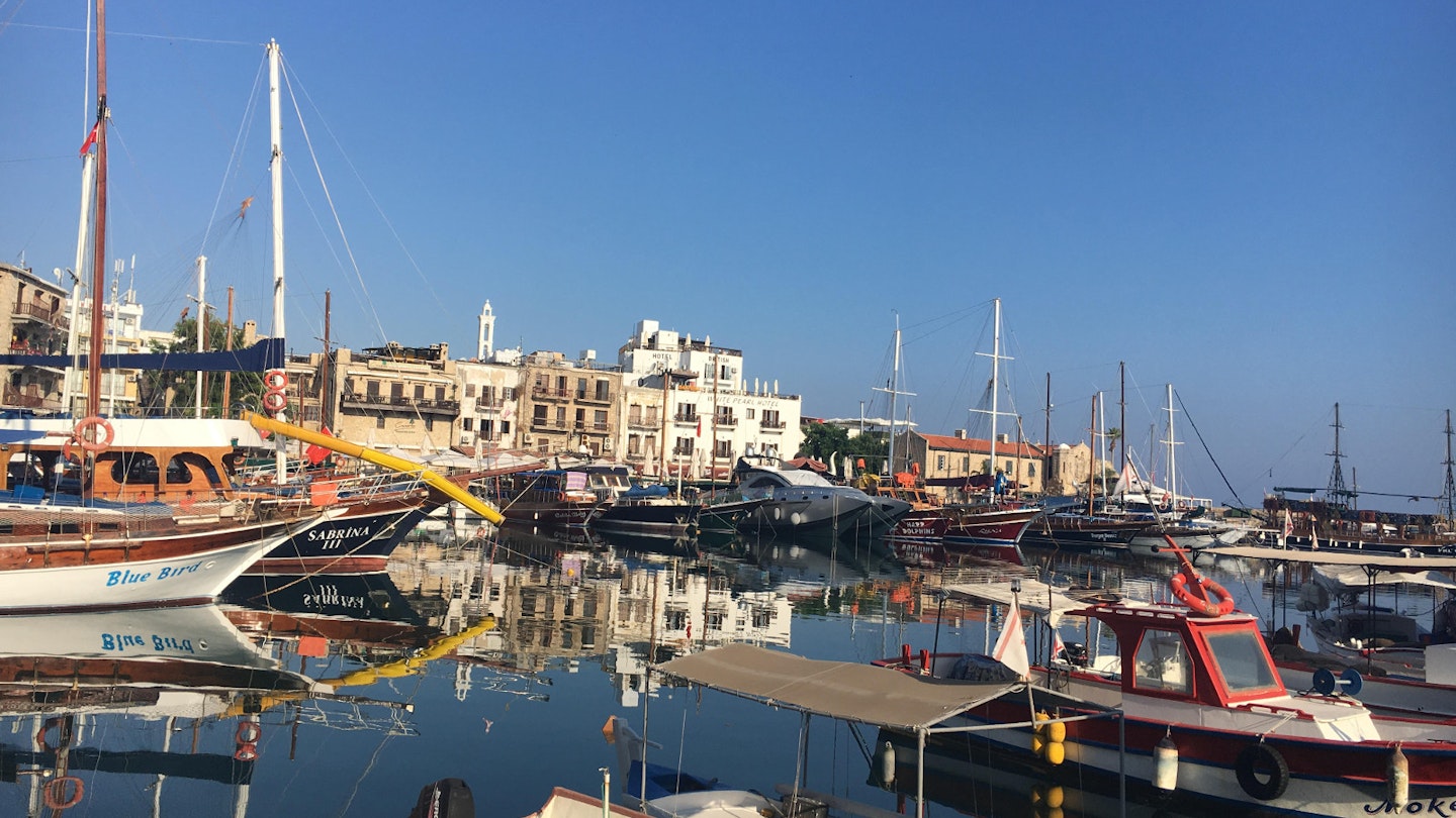 Fishing boats and traditional wooden ships moored in Kyrenia’s old harbour © Brana Vladisavljevic / Lonely Planet