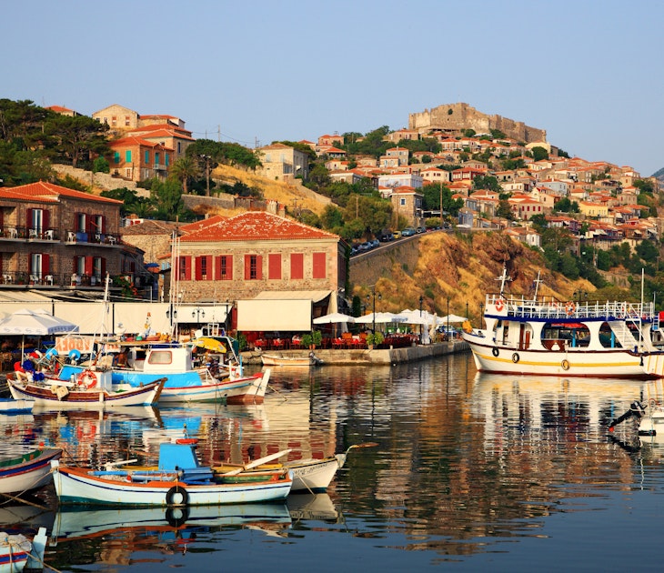 The picturesque castle-topped harbour of Molyvos (aka Mithymna) on Lesvos @ Heracles Kritikos / Shutterstock