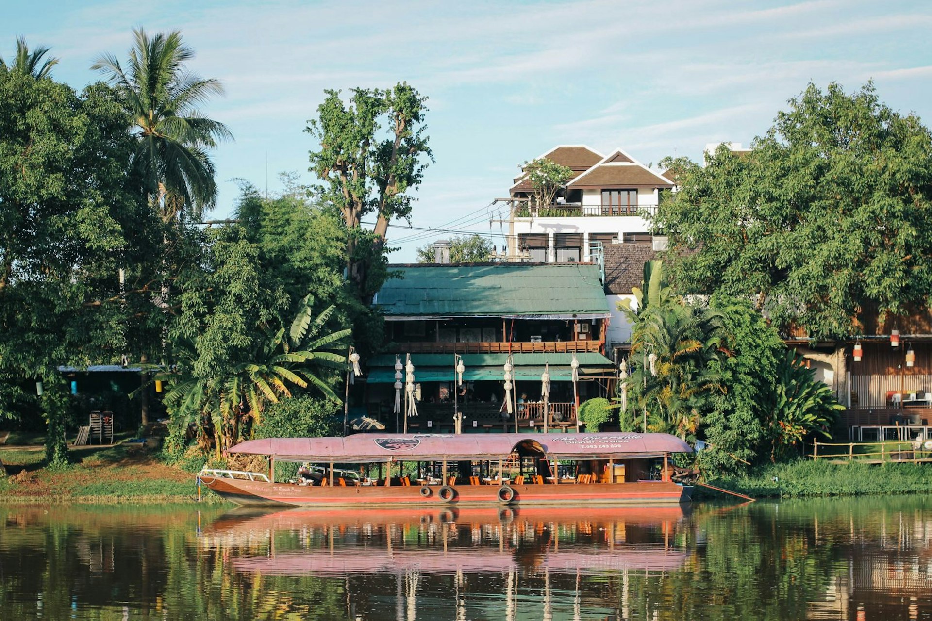 Join Chiang Mai locals for a meal and a tipple at The Riverside Bar and Restaurant © Alana Morgan / Lonely Planet